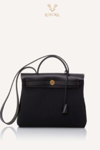 WeLove | HERMES Herbag Zip Retourne 31 Noir Toile Militaire Vache Hunter