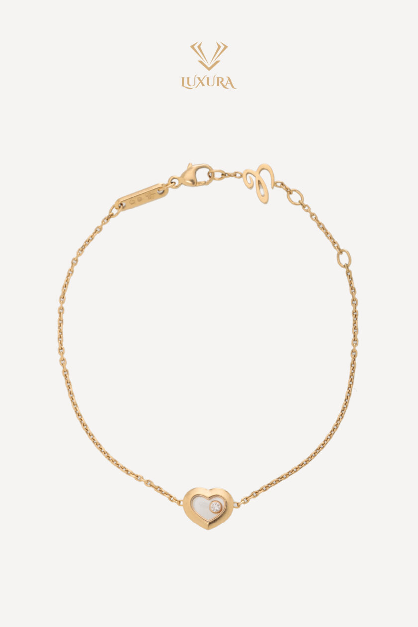 <span style="font-size: 10px; color: rgb(101, 101, 101);letter-spacing: .15em;">HARD TO FIND</span><br><strong> CHOPARD </strong><br><div style="margin-top:10px; font-size:16px;">Happy Diamonds Icons 18K Yellow Gold Bracelet </div><br>