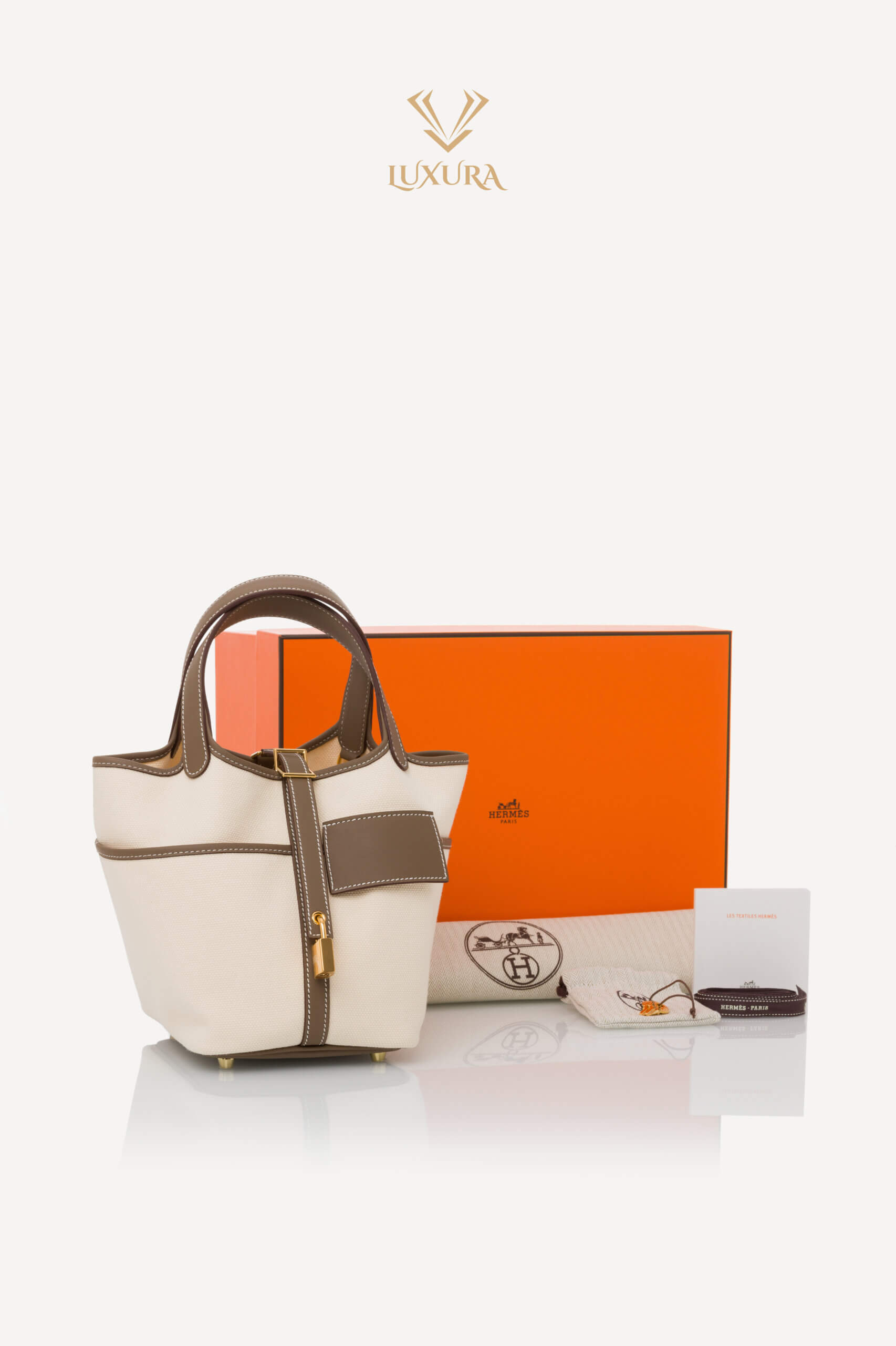 <span style="font-size: 10px; color: rgb(101, 101, 101);letter-spacing: .15em;">HARD TO FIND</span><br><strong> HERMÈS </strong><br><div style="margin-top:10px; font-size:16px;">Cargo Picotin 18 Lock Bag Canvas Swift Ecru-Etoupe Gold Hardware</div><br> - Image 2