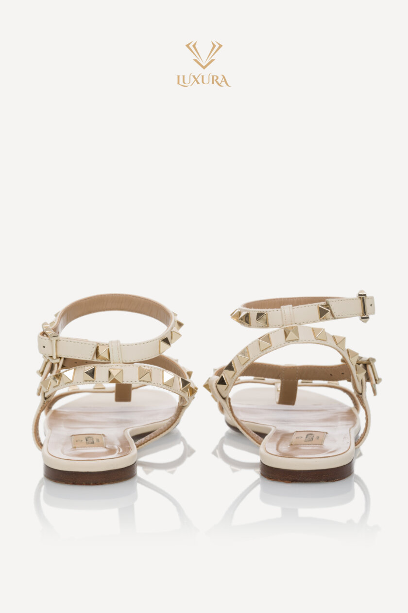<span style="font-size: 10px; color: rgb(101, 101, 101);letter-spacing: .15em;">BEST DEAL</span><br><strong> VALENTINO </strong><br><div style="margin-top:10px; font-size:16px;">Rockstud Caged Flat Slide Sandals 38</div><br> - Image 5
