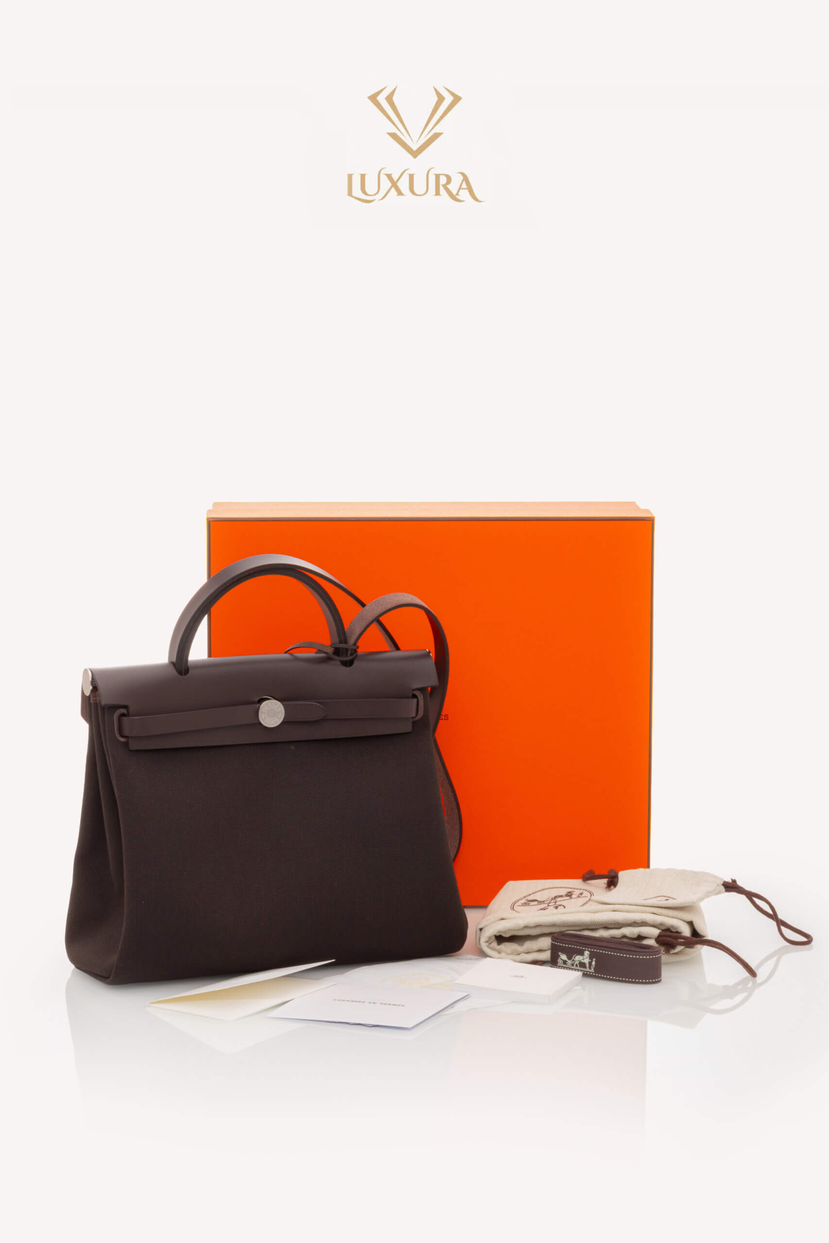 <span style="font-size: 10px; color: rgb(101, 101, 101);letter-spacing: .15em;">HARD TO FIND</span><br><strong>HERMES </strong><br><div style="margin-top:10px; font-size:16px;"> Herbag Zip RT 31 Toile Militaire Vache Hunter Dark Bronze Ebene Bag </div><br> - Image 2