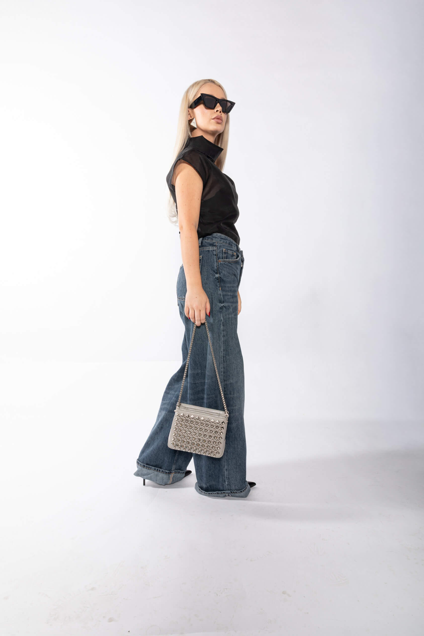 <span style="font-size: 10px; color: rgb(101, 101, 101);letter-spacing: .15em;">BEST DEAL</span><br><strong> CHRISTIAN LOUBOUTIN </strong><br><div style="margin-top:10px; font-size:16px;"> Silver Leather Studded Triloubi Clutch Bag </div><br> - Image 10