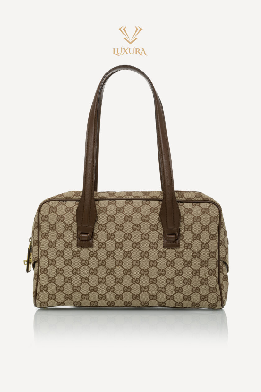 <span style="font-size: 10px; color: rgb(101, 101, 101);letter-spacing: .15em;">HARD TO FIND</span><br><strong> GUCCI </strong><br><div style="margin-top:10px; font-size:16px;">Monogram Tote Bag Brown</div><br>