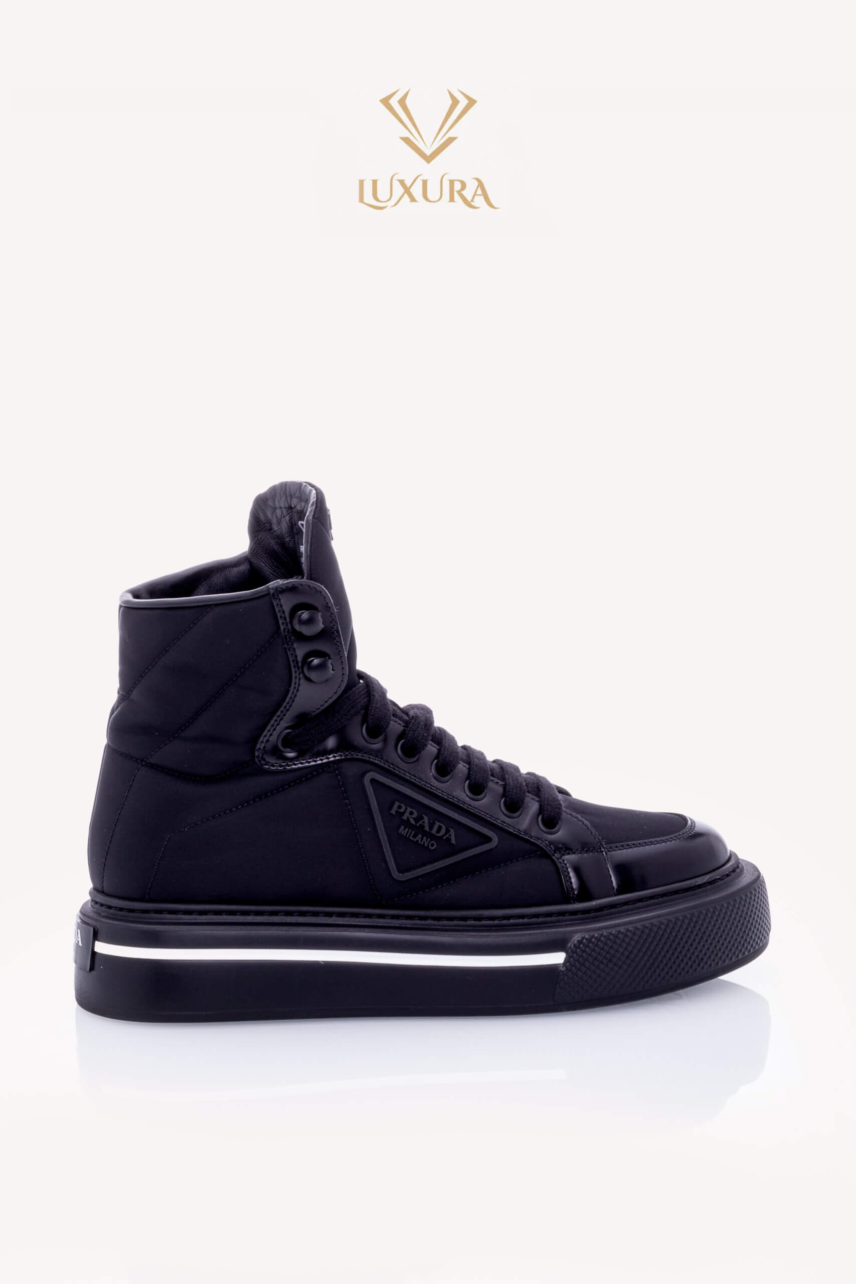 <span style="font-size: 10px; color: rgb(101, 101, 101);letter-spacing: .15em;">HARD TO FIND</span><br><strong> PRADA </strong><br><div style="margin-top:10px; font-size:16px;"> High Top Tonal Panel Sneakers 37.5 </div><br>