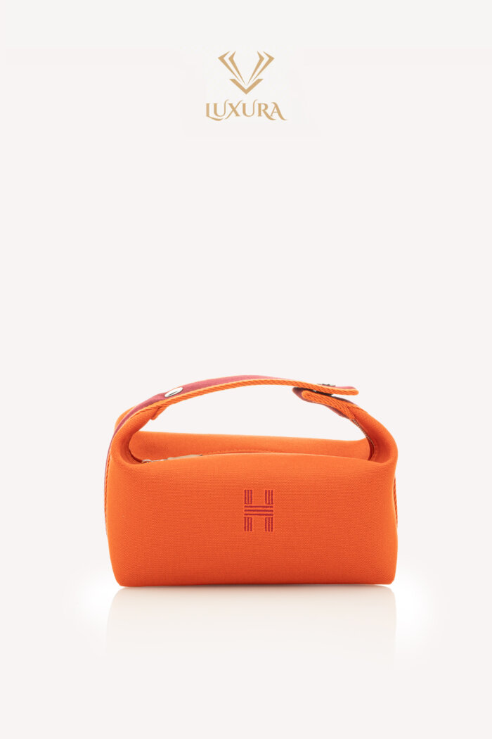 <span style="font-size: 10px; color: rgb(101, 101, 101);letter-spacing: .15em;">HARD TO FIND</span><br><strong> HERMES </strong><br><div style="margin-top:10px; font-size:16px;">Canvas Small Bride-A-Brac Pouch Orange Burgundy</div><br>