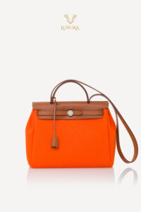 Genti | HERMES Vache Hunter Toile Herbag Zip 31 PM Orange<br