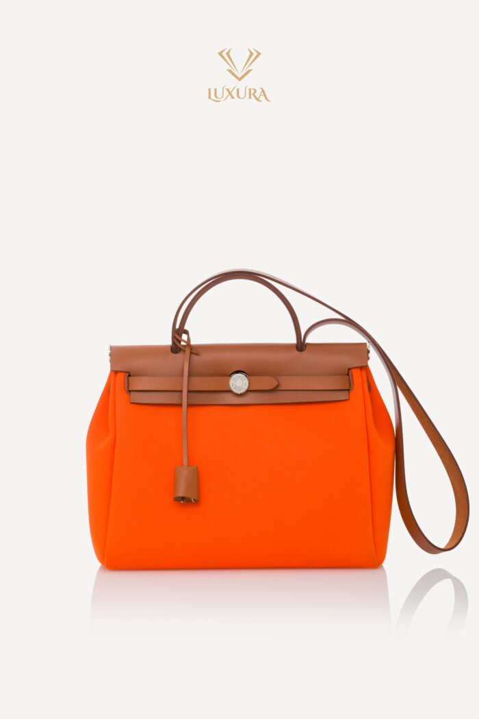 Genti | HERMES Vache Hunter Toile Herbag Zip 31 PM Orange