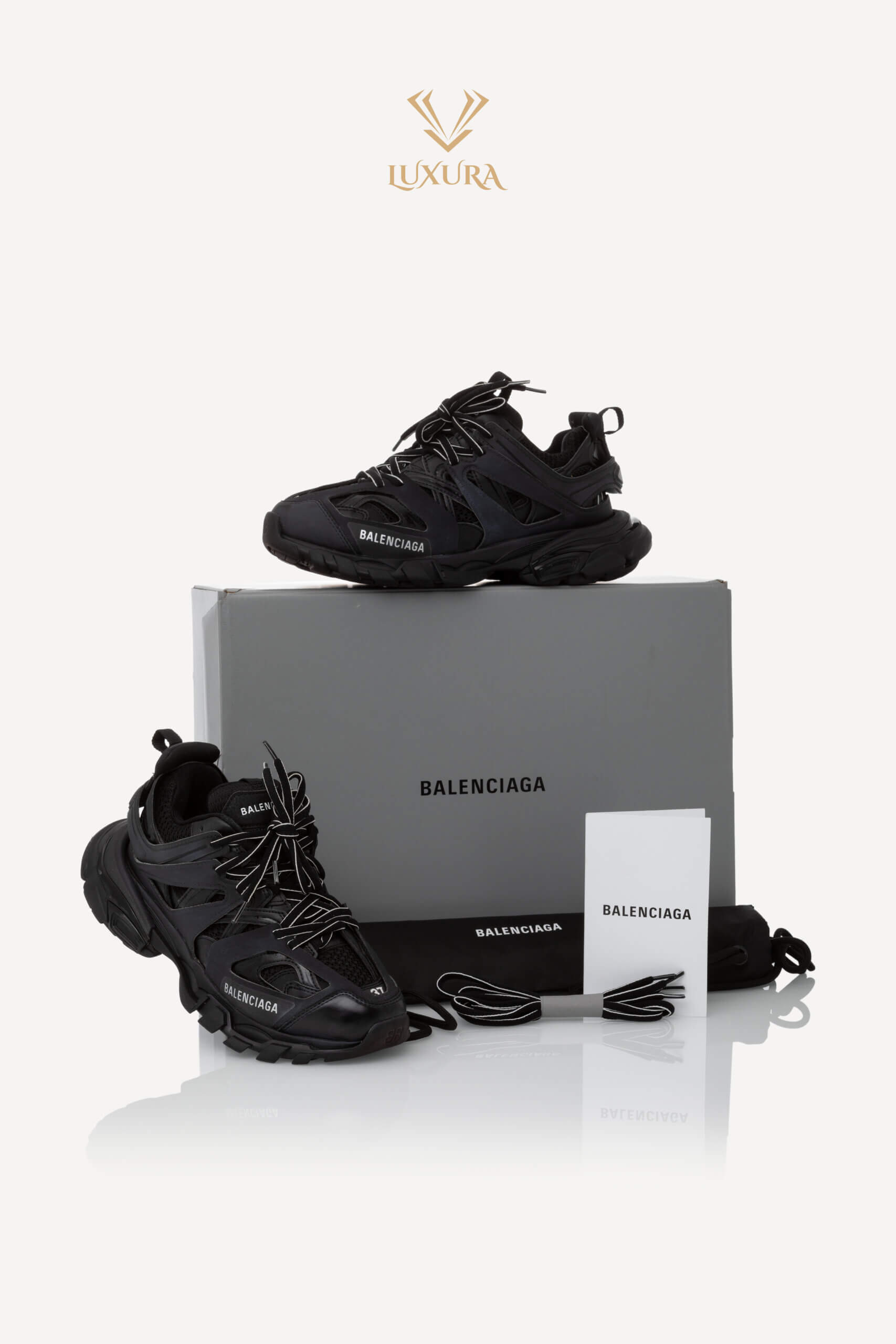 <span style="font-size: 10px; color: rgb(101, 101, 101);letter-spacing: .15em;">BEST DEAL</span><br><strong> BALENCIAGA </strong><br><div style="margin-top:10px; font-size:16px;"> Track Sneakers Black 37 </div><br> - Image 2