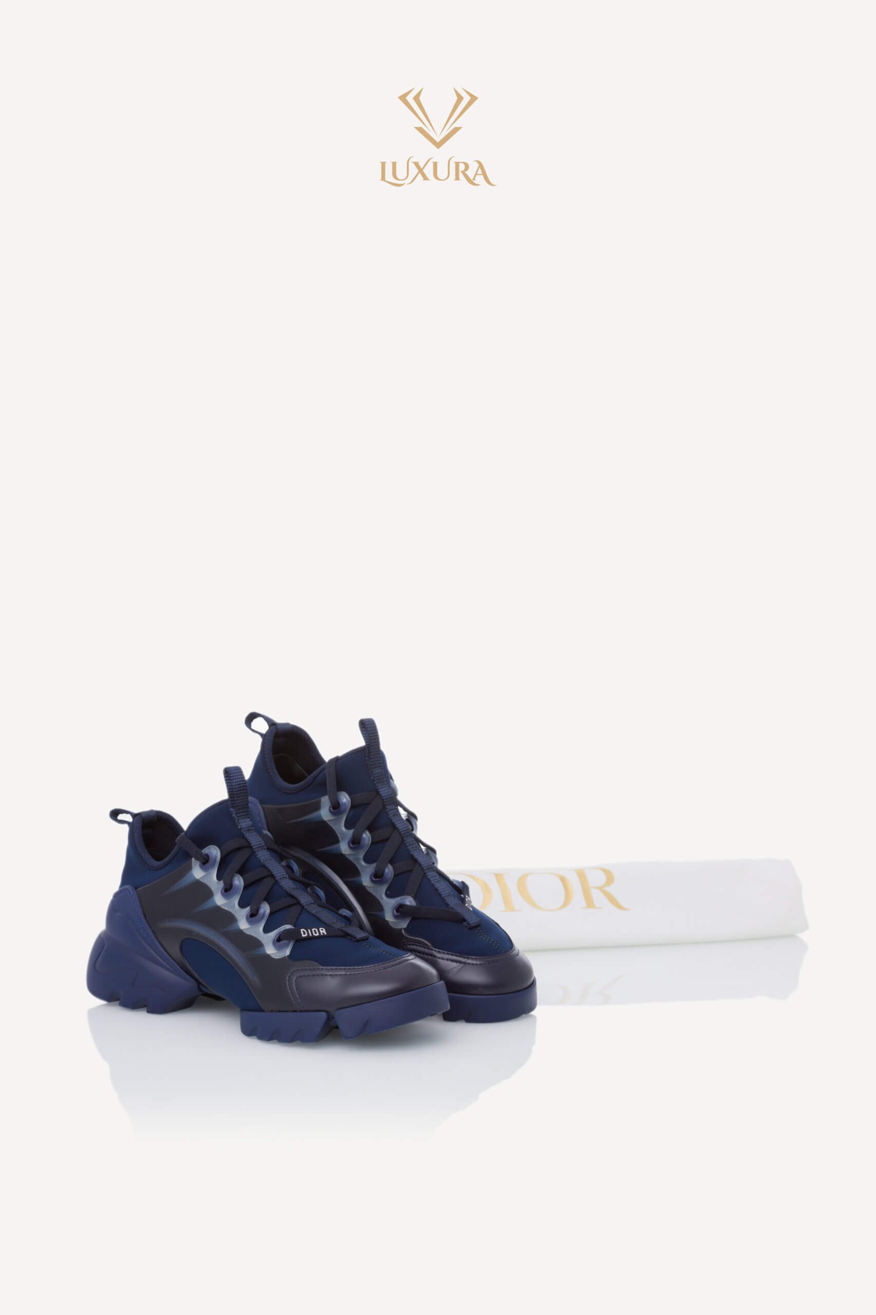 <span style="font-size: 10px; color: rgb(101, 101, 101);letter-spacing: .15em;">BEST DEAL</span><br><strong> DIOR </strong><br><div style="margin-top:10px; font-size:16px;"> Neoprene Rubber D-Connect Sneakers Indigo Blue 37 </div><br> - Image 2