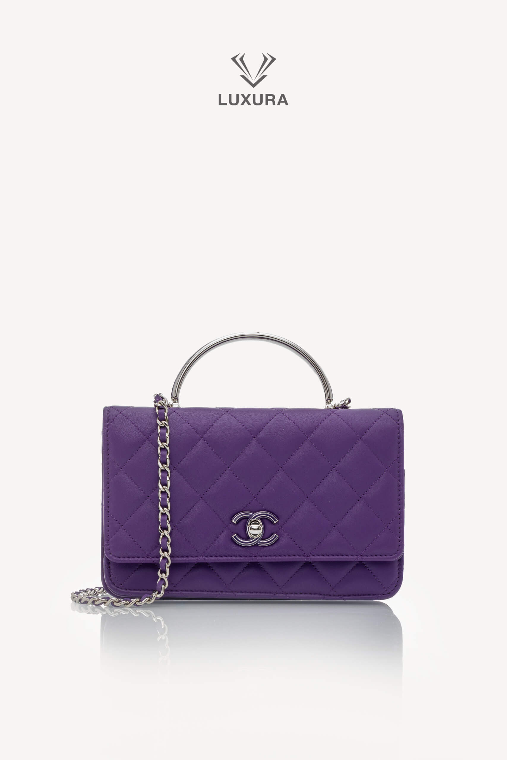 <span style="font-size: 10px;letter-spacing: .15em">HARD TO FIND</span><br>            <strong>CHANEL</strong><br>            <div style="margin-top:10px;font-size:16px">Top Handle Wallet On Chain Purple Lambskin Silver Hardware</div><br>