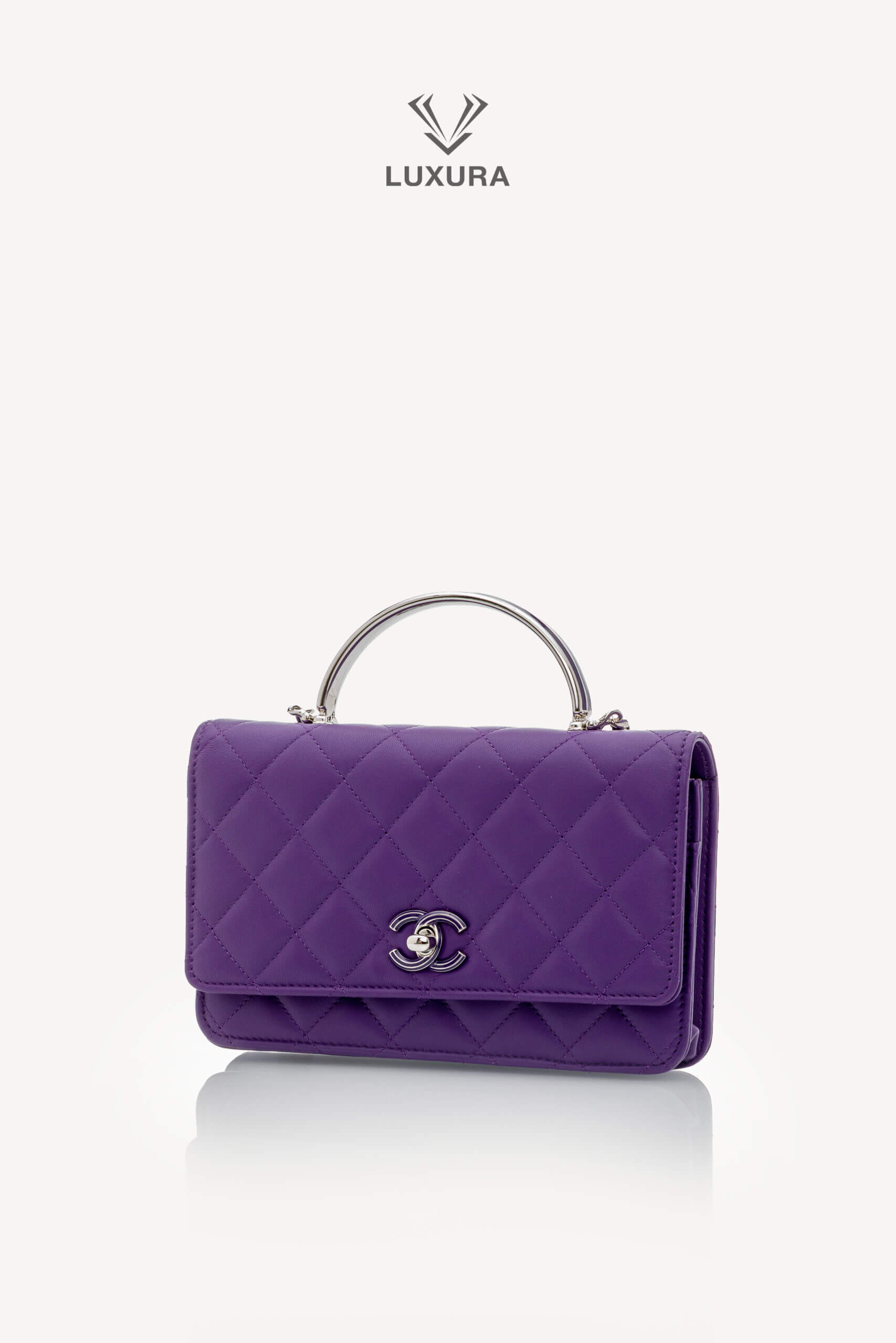 <span style="font-size: 10px;letter-spacing: .15em">HARD TO FIND</span><br>            <strong>CHANEL</strong><br>            <div style="margin-top:10px;font-size:16px">Top Handle Wallet On Chain Purple Lambskin Silver Hardware</div><br> - Image 10