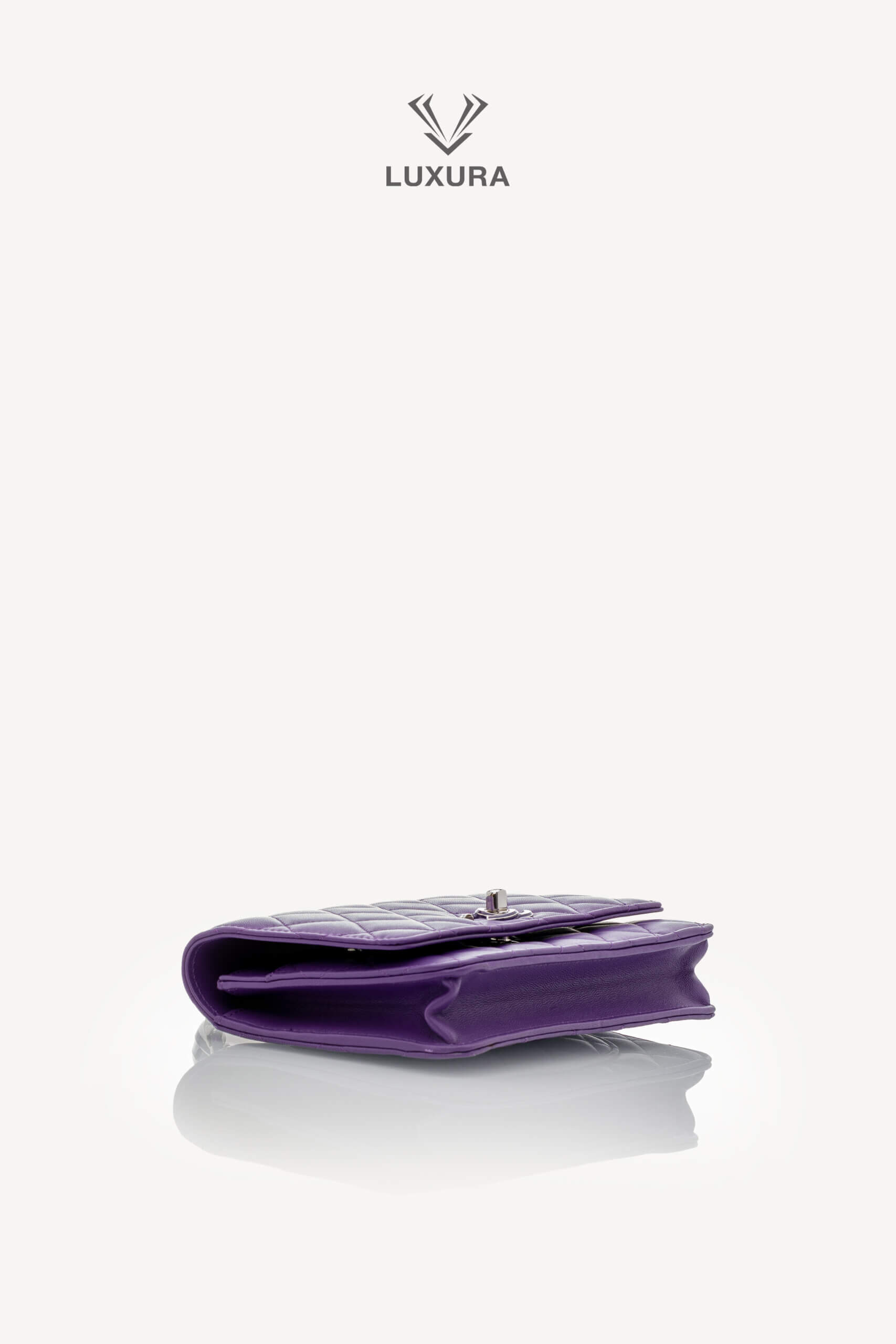<span style="font-size: 10px;letter-spacing: .15em">HARD TO FIND</span><br>            <strong>CHANEL</strong><br>            <div style="margin-top:10px;font-size:16px">Top Handle Wallet On Chain Purple Lambskin Silver Hardware</div><br> - Image 25