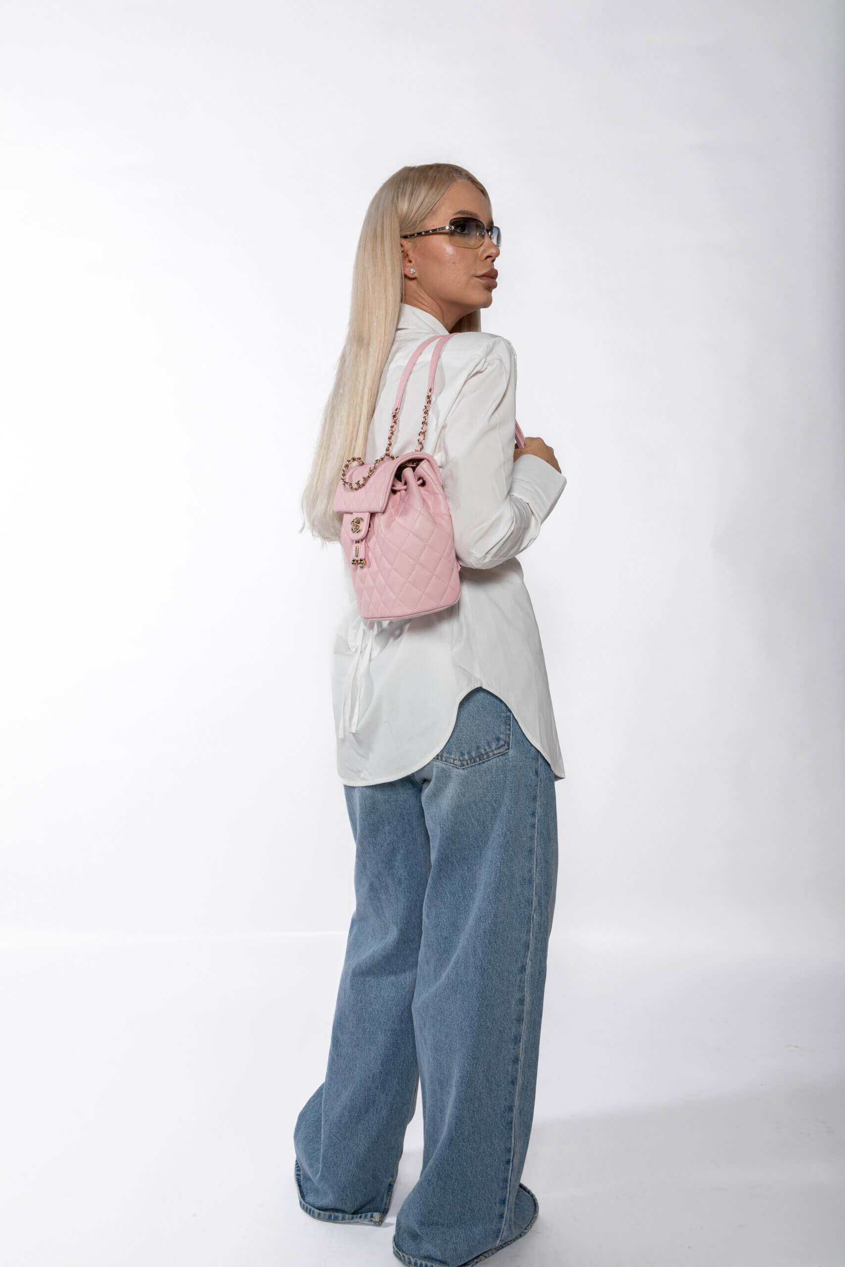 <span style="font-size: 10px;letter-spacing: .15em">NEW COLLECTION</span><br> <strong>CHANEL</strong><br> <div style="margin-top:10px;font-size:16px">Caviar Quilted Small Urban Spirit Backpack Pink</div><br> - Image 5