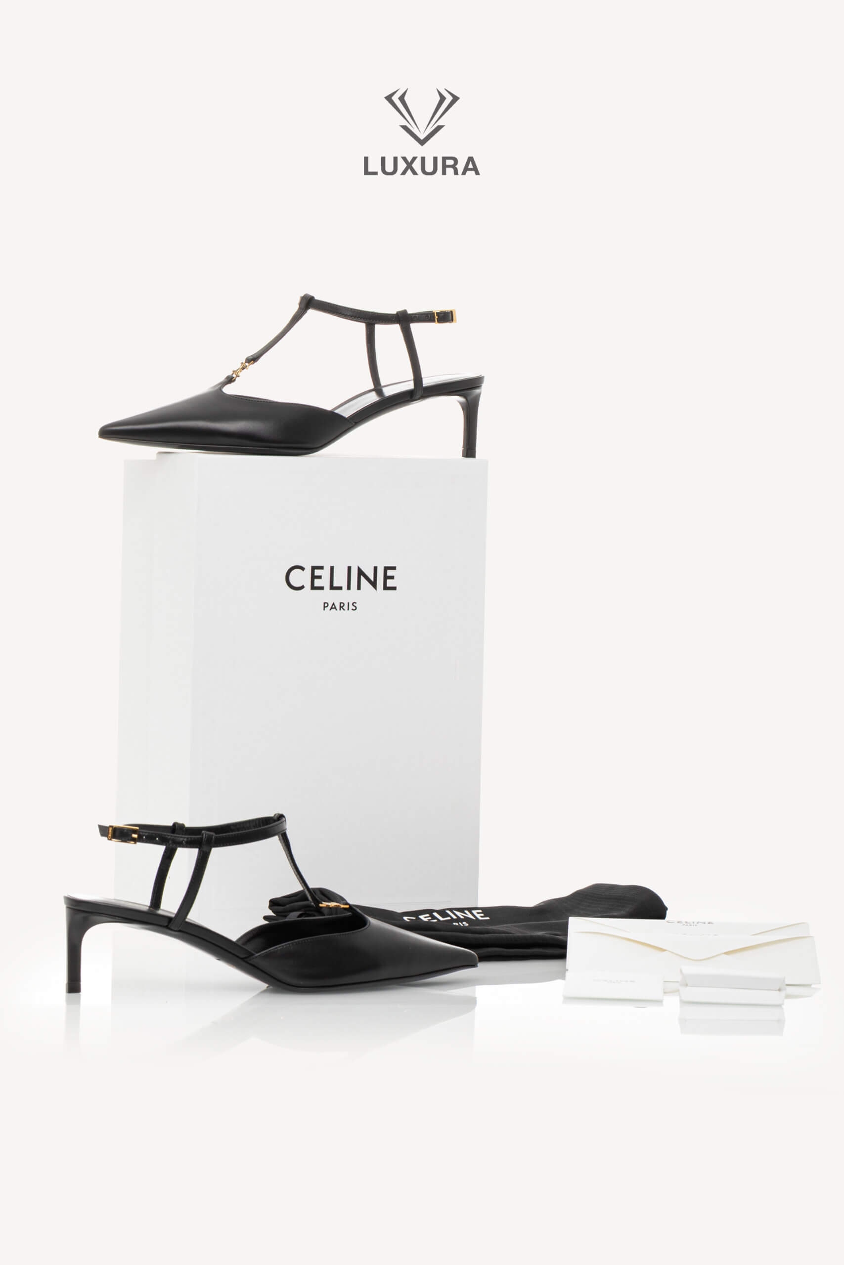 <span style="font-size: 10px;letter-spacing: .15em">NEW COLLECTION</span><br> <strong>CELINE</strong><br> <div style="margin-top:10px;font-size:16px">Kitten T-Bar Strap Pumps in Calfskin Black 37 ( true size 37.5 )</div><br> - Image 2
