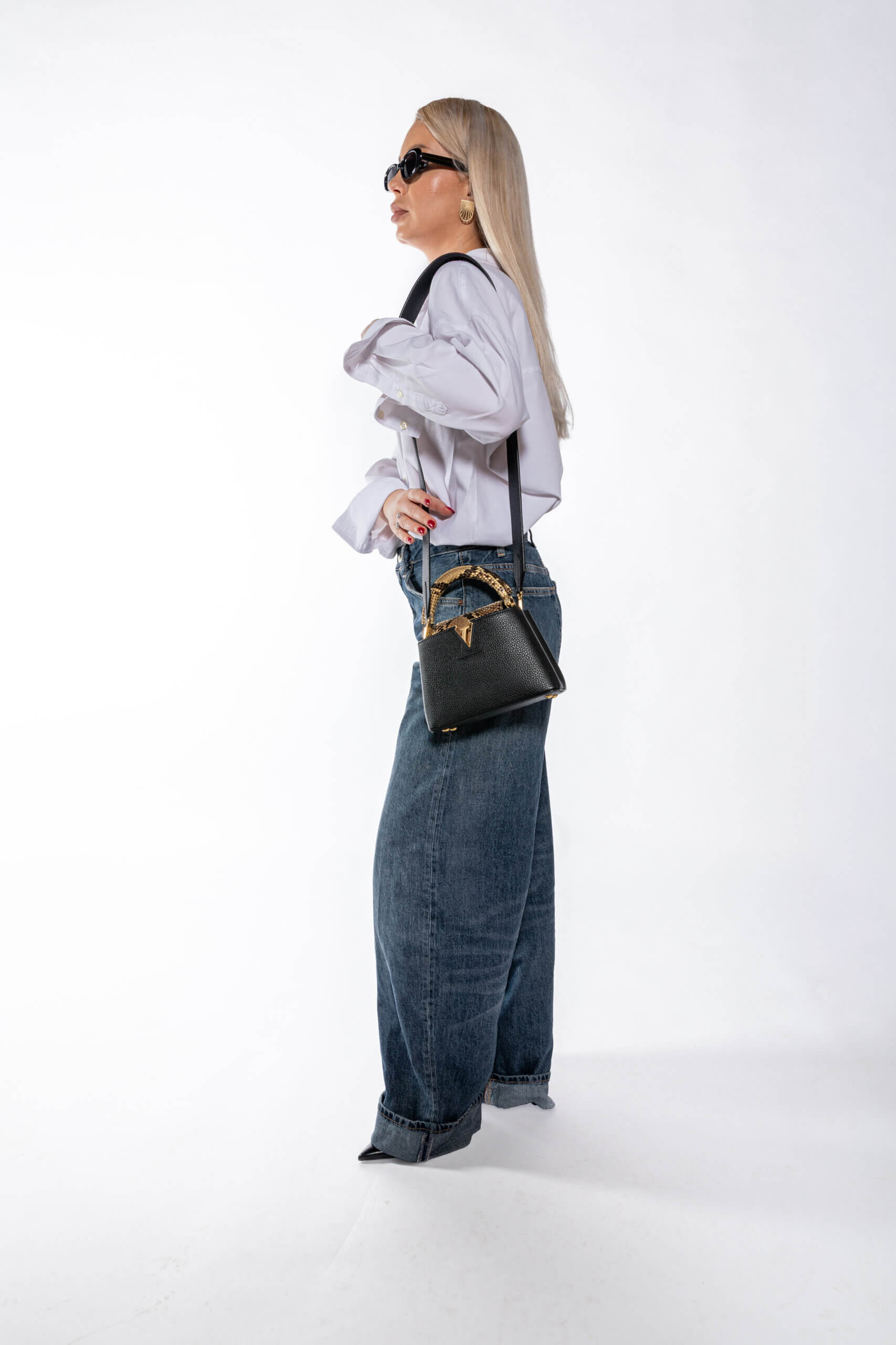 <span style="font-size: 10px;letter-spacing: .15em">HARD TO FIND</span><br> <strong>LOUIS VUITTON</strong><br> <div style="margin-top:10px;font-size:16px">Taurillon Leather and Snakeskin Capucines Mini Bag N96467</div><br> - Image 12