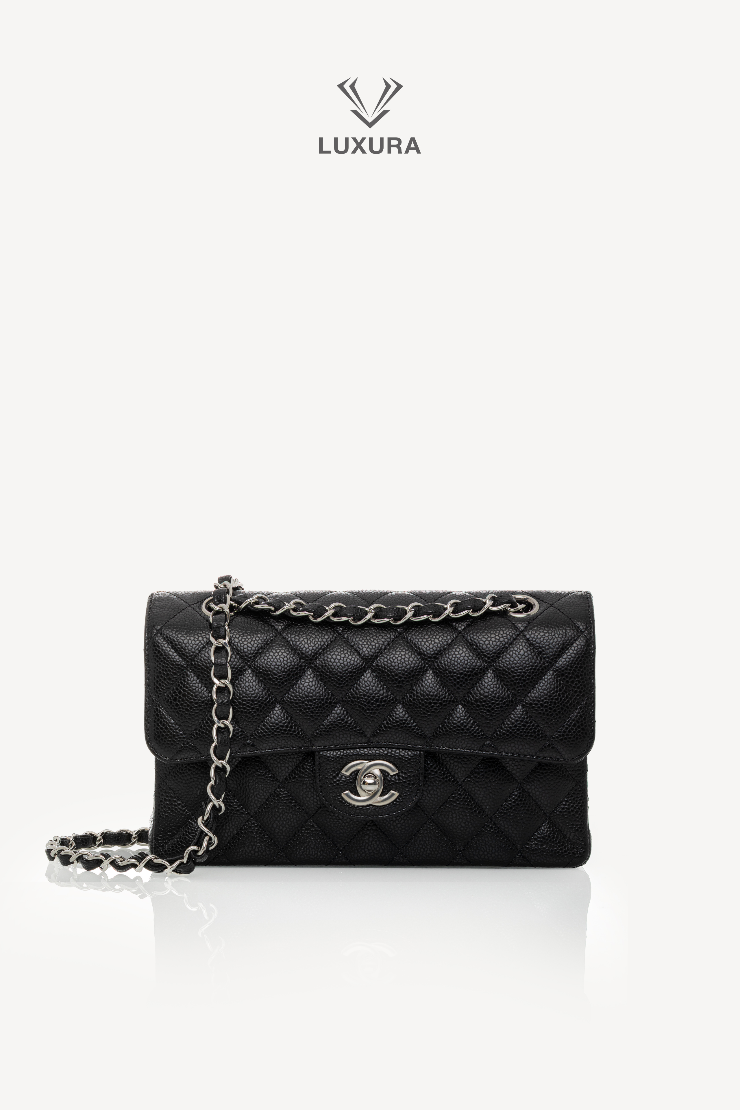 <span style="font-size: 10px;letter-spacing: .15em">HARD TO FIND</span><br>            <strong>CHANEL</strong><br>            <div style="margin-top:10px;font-size:16px">Caviar Quilted Small Double Flap Bag With silver Hardware</div><br>