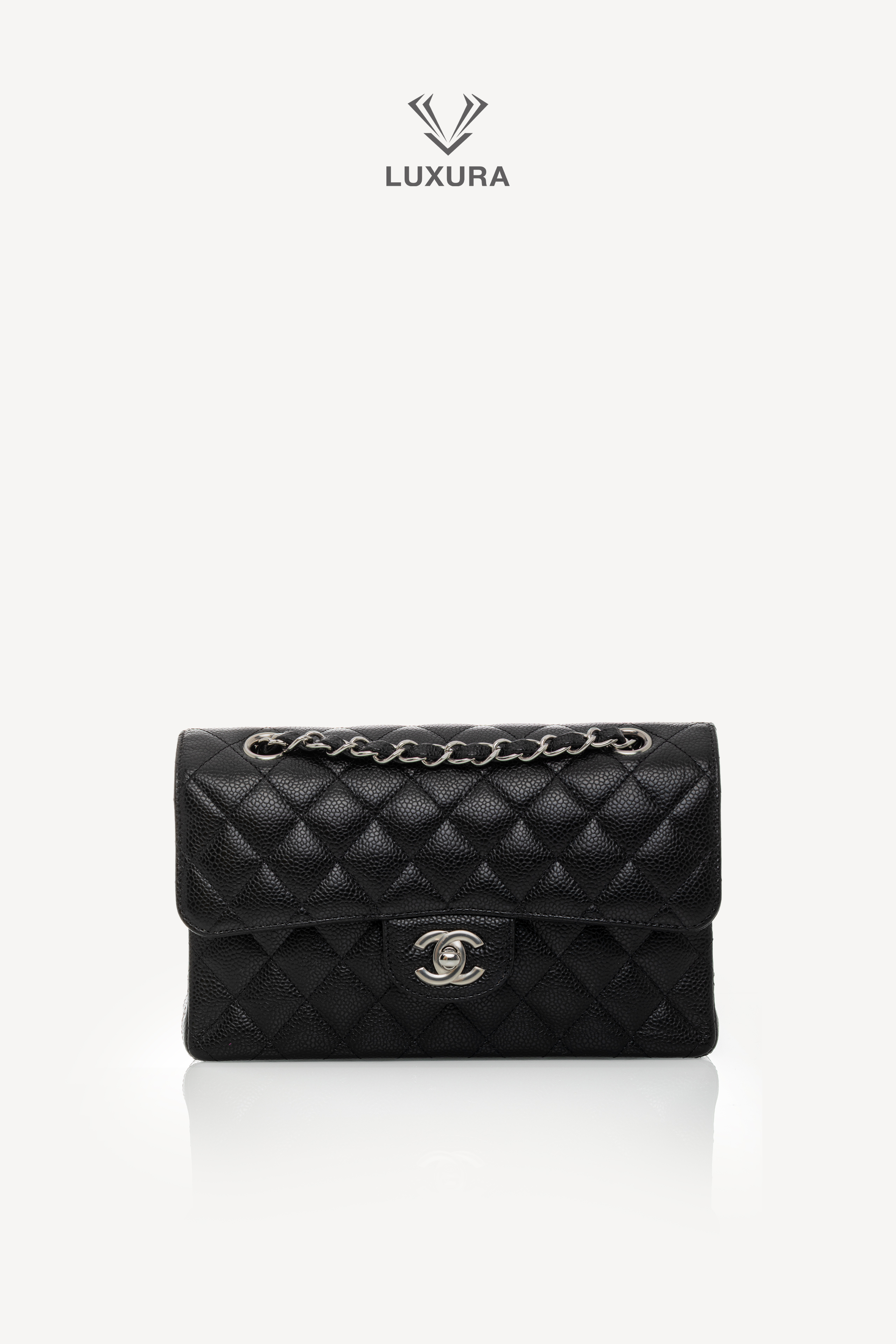<span style="font-size: 10px;letter-spacing: .15em">HARD TO FIND</span><br>            <strong>CHANEL</strong><br>            <div style="margin-top:10px;font-size:16px">Caviar Quilted Small Double Flap Bag With silver Hardware</div><br> - Image 6