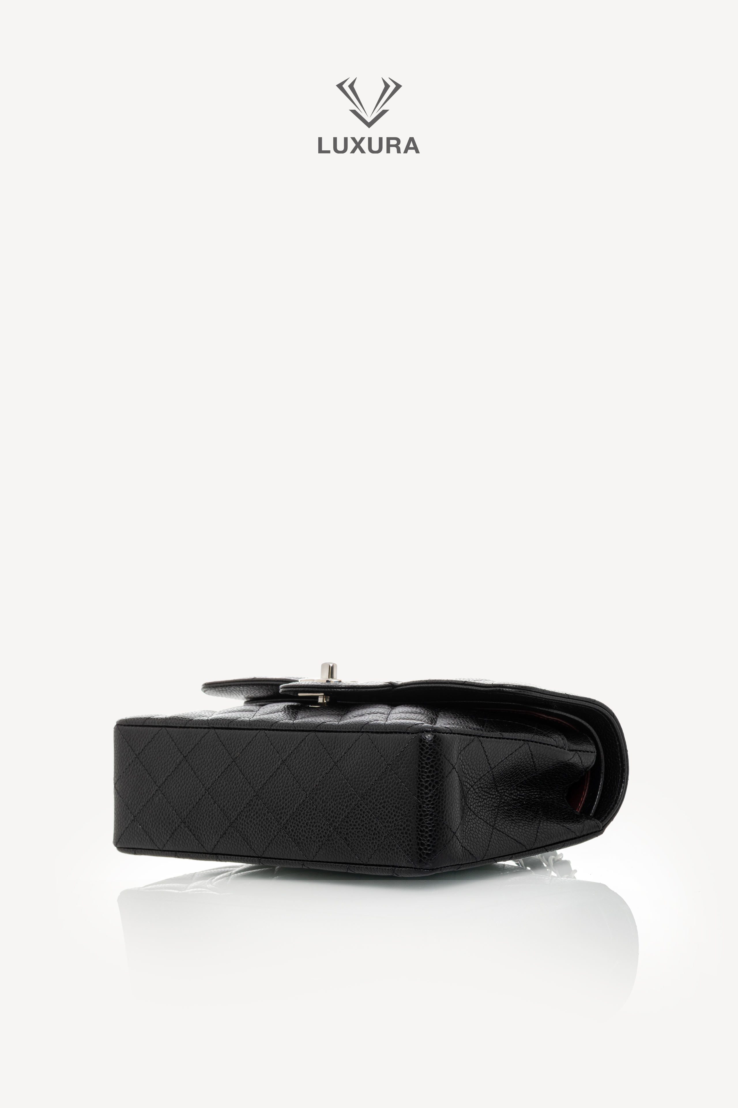 <span style="font-size: 10px;letter-spacing: .15em">HARD TO FIND</span><br>            <strong>CHANEL</strong><br>            <div style="margin-top:10px;font-size:16px">Caviar Quilted Small Double Flap Bag With silver Hardware</div><br> - Image 31