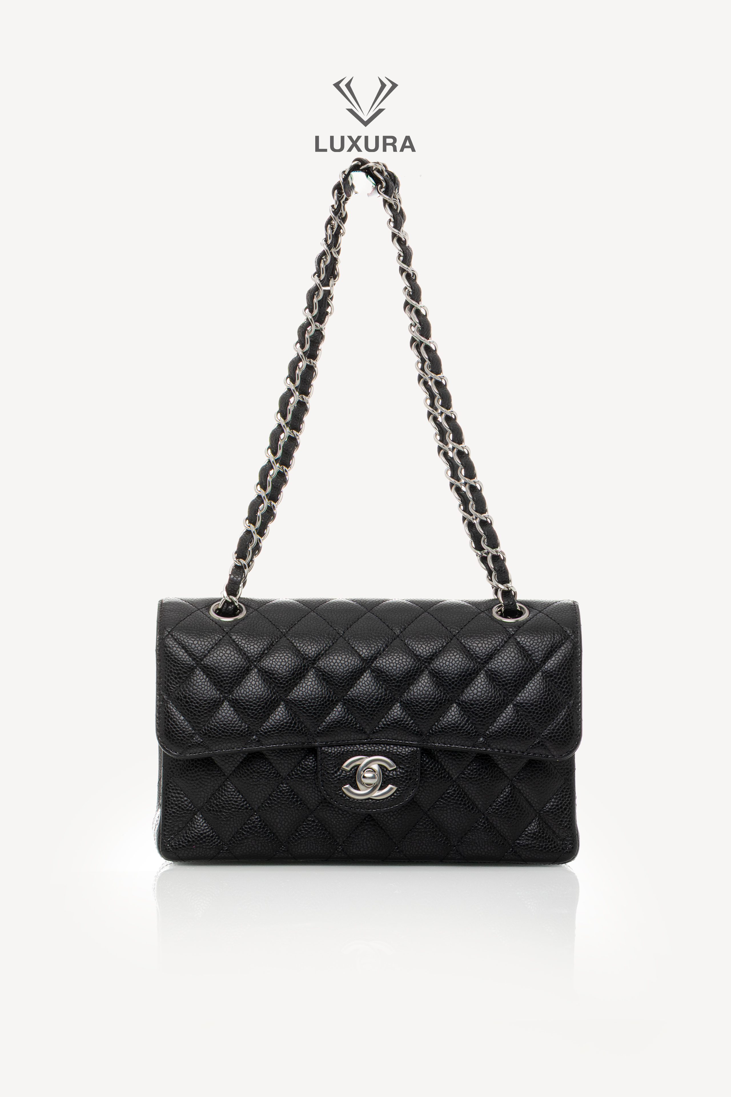<span style="font-size: 10px;letter-spacing: .15em">HARD TO FIND</span><br>            <strong>CHANEL</strong><br>            <div style="margin-top:10px;font-size:16px">Caviar Quilted Small Double Flap Bag With silver Hardware</div><br> - Image 4