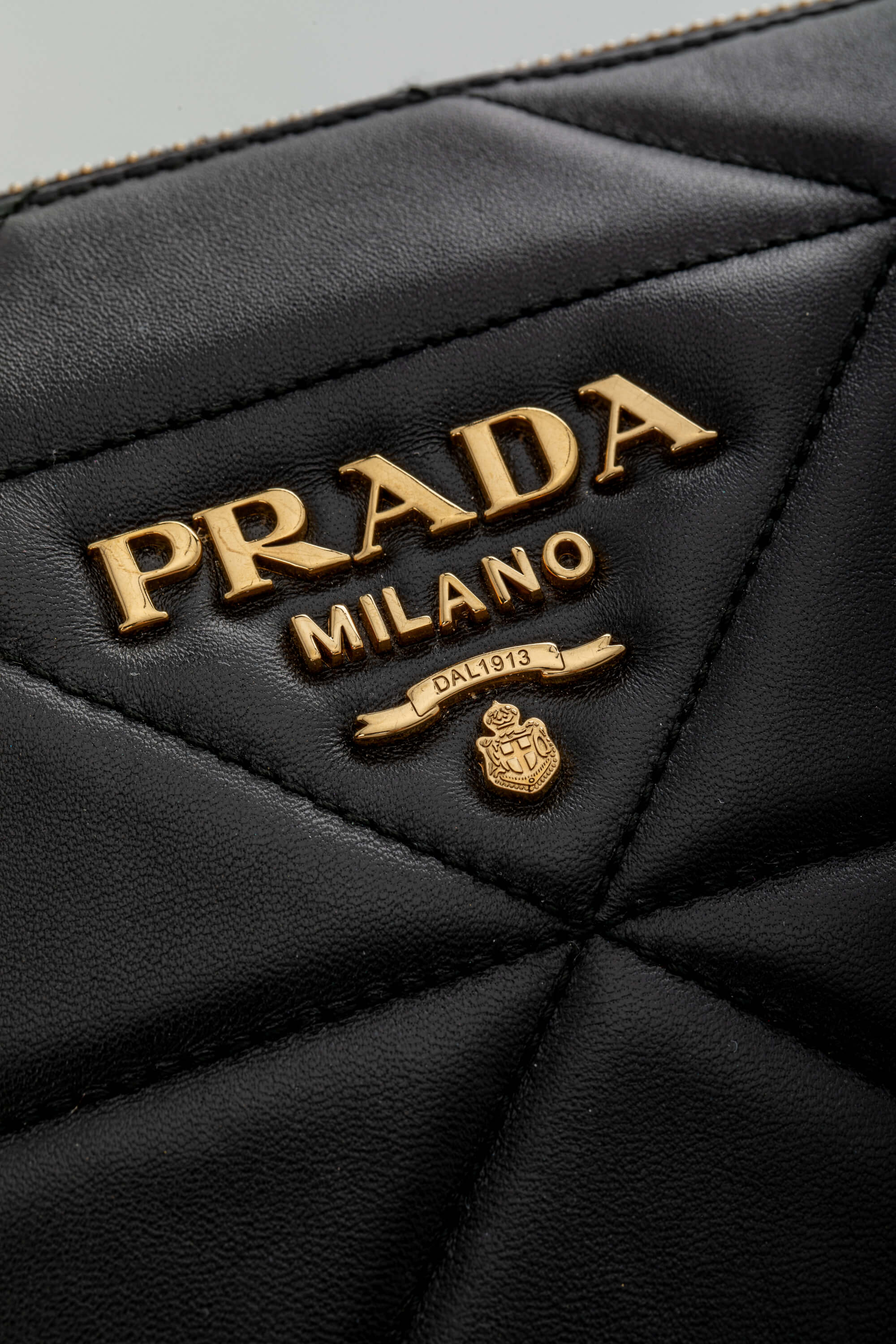 <span style="font-size: 10px;letter-spacing: .15em"></span><br> <strong>PRADA</strong><br> <div style="margin-top:10px;font-size:16px">Quilted Nappa Stitched Leather Crossbody Bag Black</div><br> - Image 14