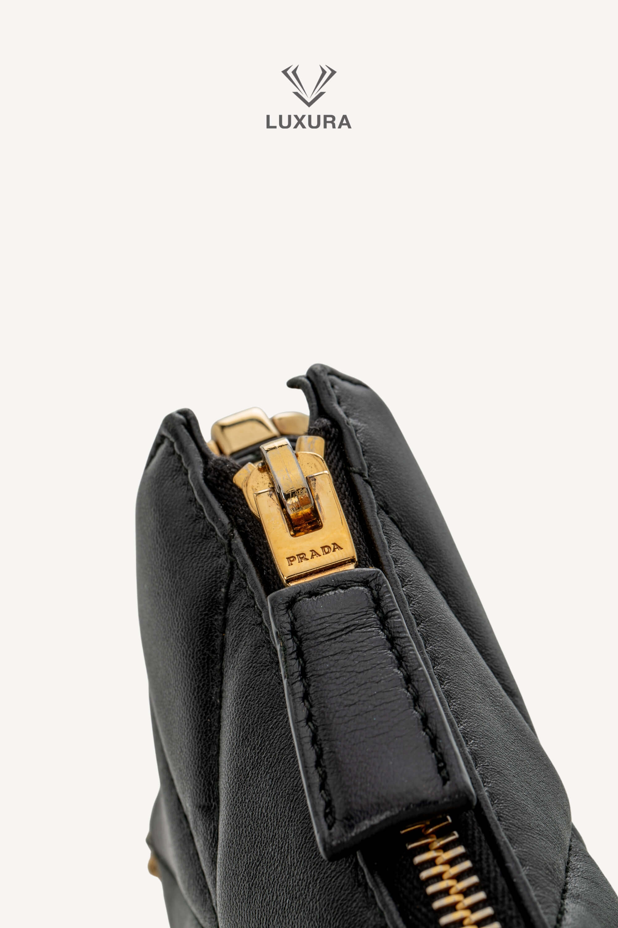 <span style="font-size: 10px;letter-spacing: .15em"></span><br> <strong>PRADA</strong><br> <div style="margin-top:10px;font-size:16px">Quilted Nappa Stitched Leather Crossbody Bag Black</div><br> - Image 12