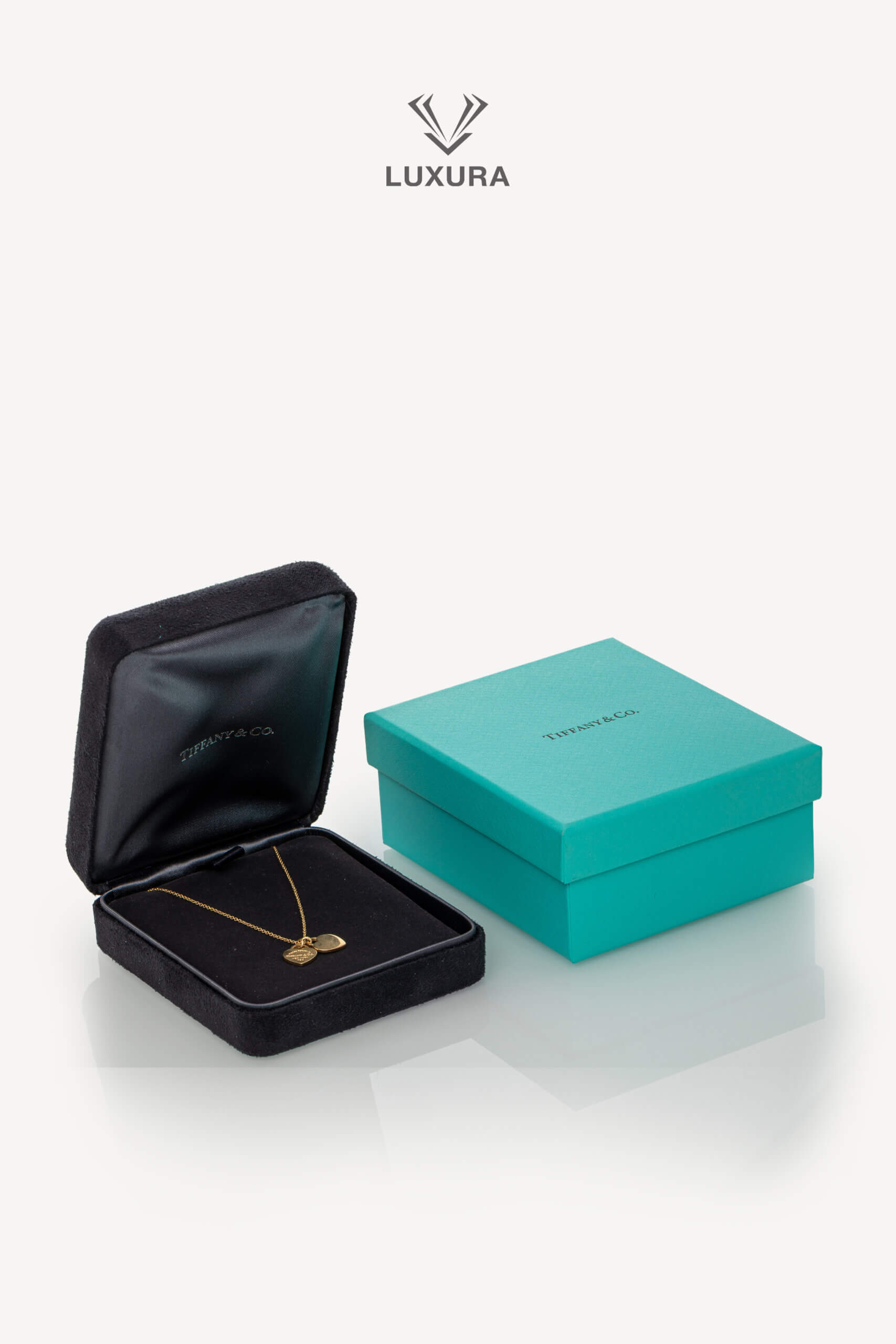 <span style="font-size: 10px;letter-spacing: .15em">HARD TO FIND</span><br>            <strong>TIFFANY & CO</strong><br>            <div style="margin-top:10px;font-size:16px">Return to Tiffany Double Heart Tag Pendant in Yellow Gold Mini</div><br> - Image 5