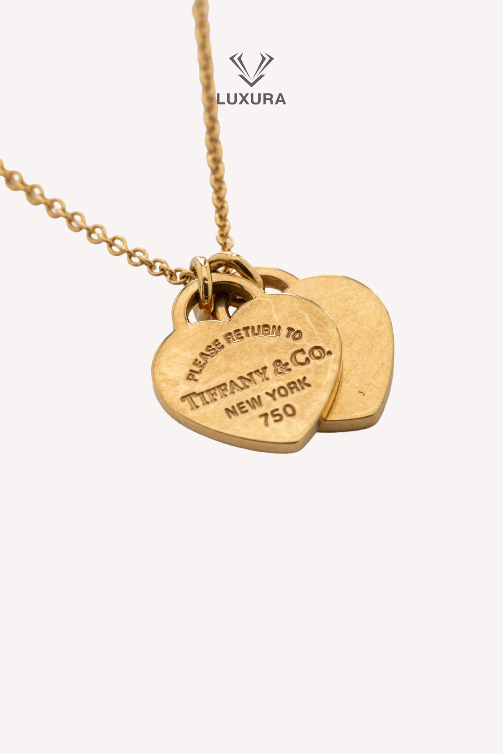<span style="font-size: 10px;letter-spacing: .15em">HARD TO FIND</span><br>            <strong>TIFFANY & CO</strong><br>            <div style="margin-top:10px;font-size:16px">Return to Tiffany Double Heart Tag Pendant in Yellow Gold Mini</div><br> - Image 7