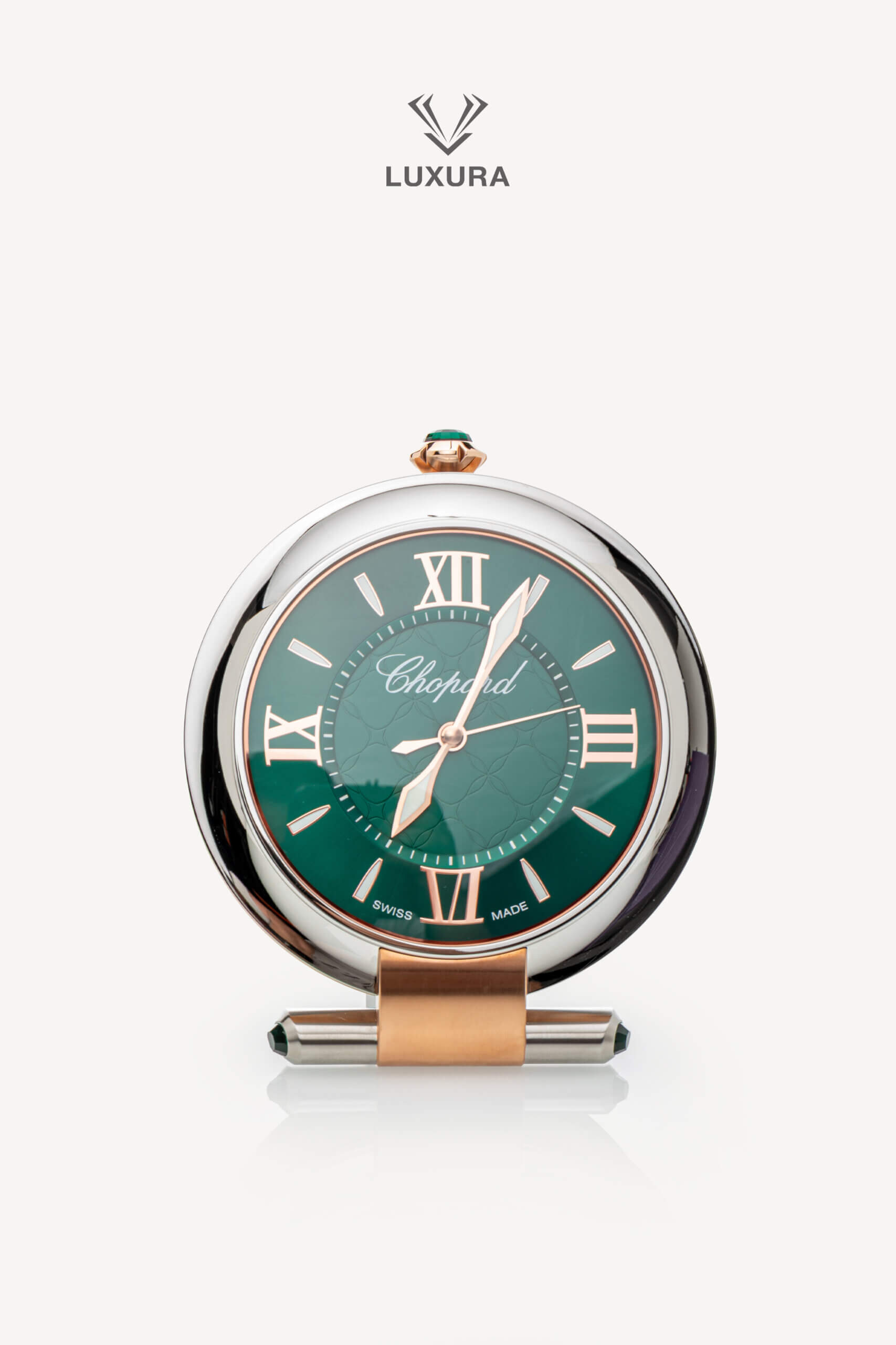 <span style="font-size: 10px;letter-spacing: .15em">HARD TO FIND</span><br> <strong>CHOPARD</strong><br> <div style="margin-top:10px;font-size:16px">Imperiale Alarm Clock Stainless Steel Rose Gold Finish</div><br>
