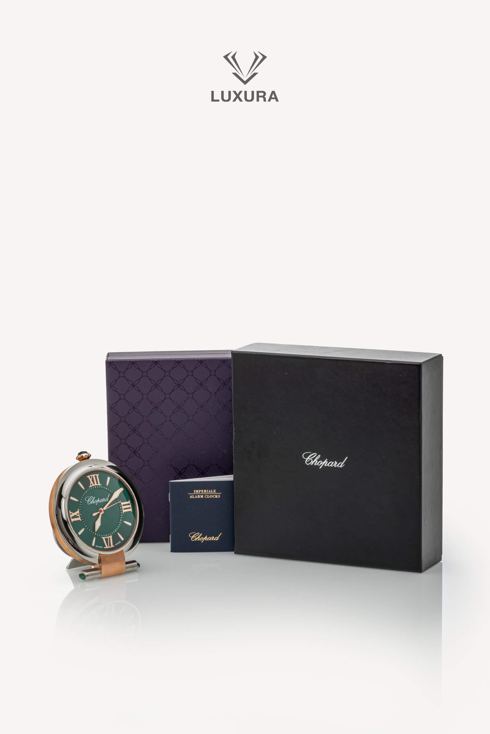 <span style="font-size: 10px;letter-spacing: .15em">HARD TO FIND</span><br> <strong>CHOPARD</strong><br> <div style="margin-top:10px;font-size:16px">Imperiale Alarm Clock Stainless Steel Rose Gold Finish</div><br> - Image 3