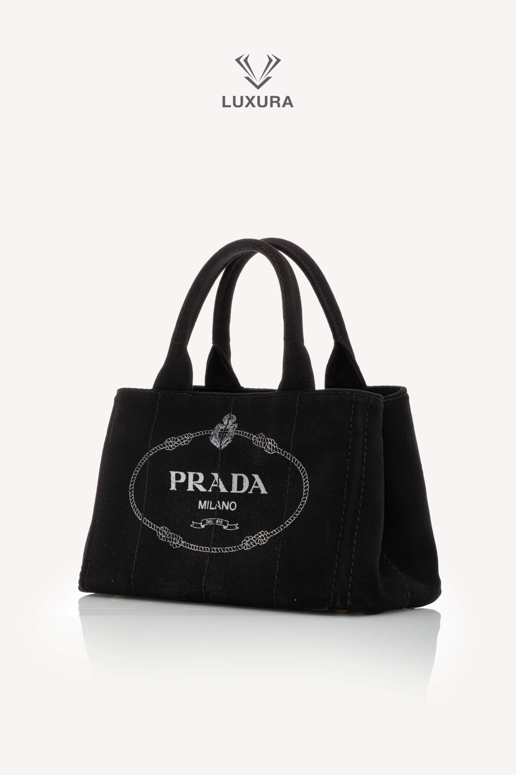 <span style="font-size: 10px;letter-spacing: .15em">HARD TO FIND</span><br> <strong>PRADA</strong><br> <div style="margin-top:10px;font-size:16px">Canapa Logo Tote Bag Black</div><br> - Image 7