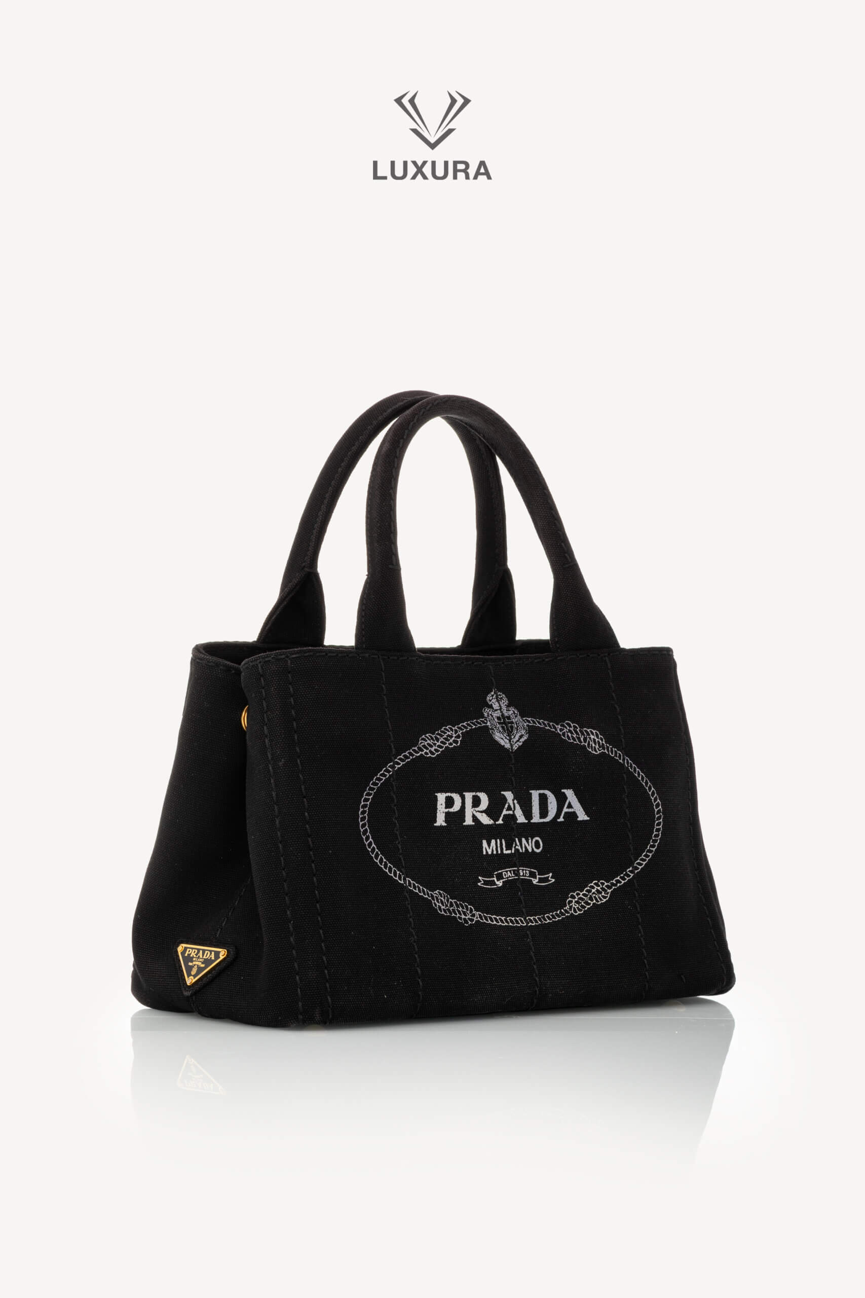 <span style="font-size: 10px;letter-spacing: .15em">HARD TO FIND</span><br> <strong>PRADA</strong><br> <div style="margin-top:10px;font-size:16px">Canapa Logo Tote Bag Black</div><br> - Image 3