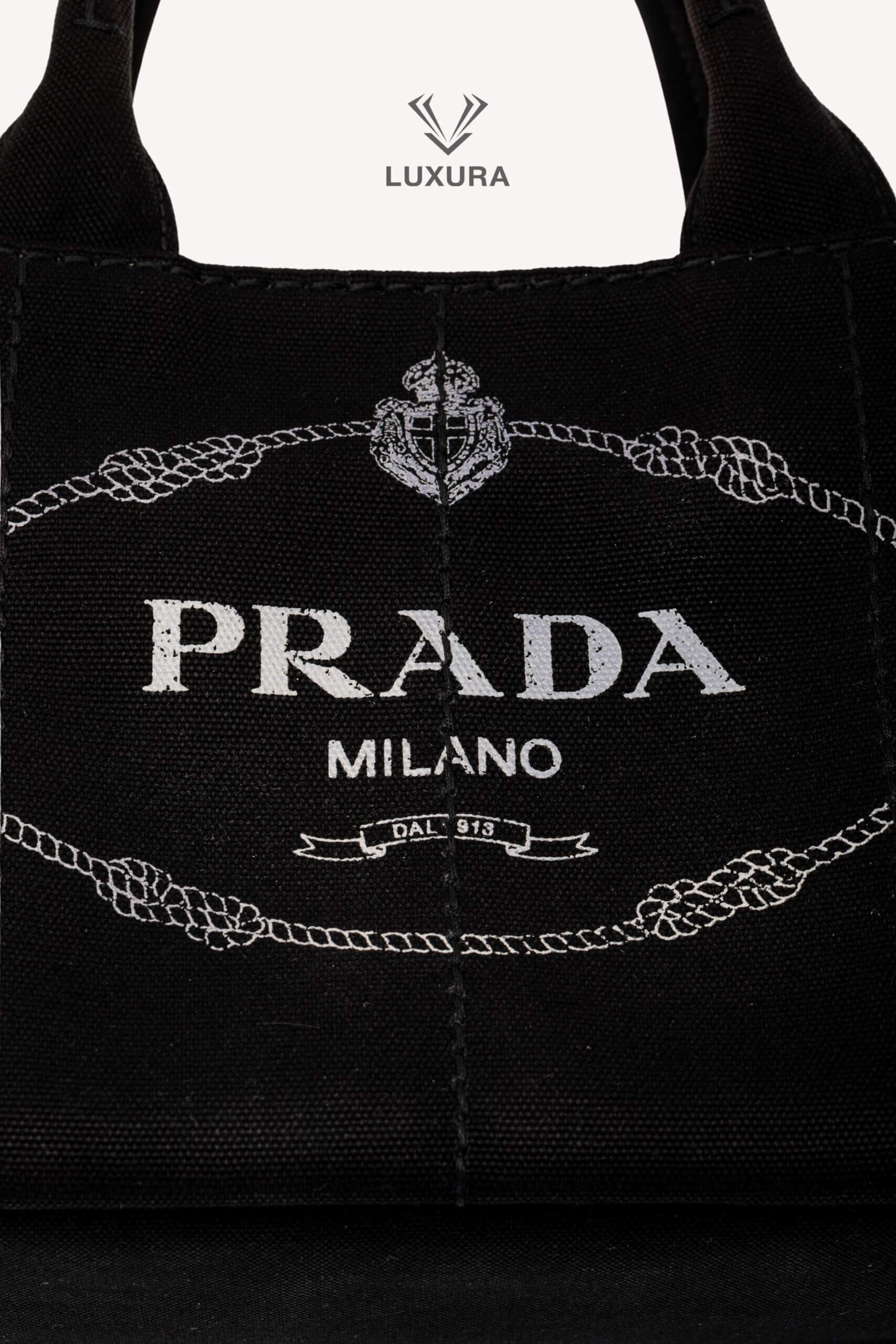 <span style="font-size: 10px;letter-spacing: .15em">HARD TO FIND</span><br> <strong>PRADA</strong><br> <div style="margin-top:10px;font-size:16px">Canapa Logo Tote Bag Black</div><br> - Image 15