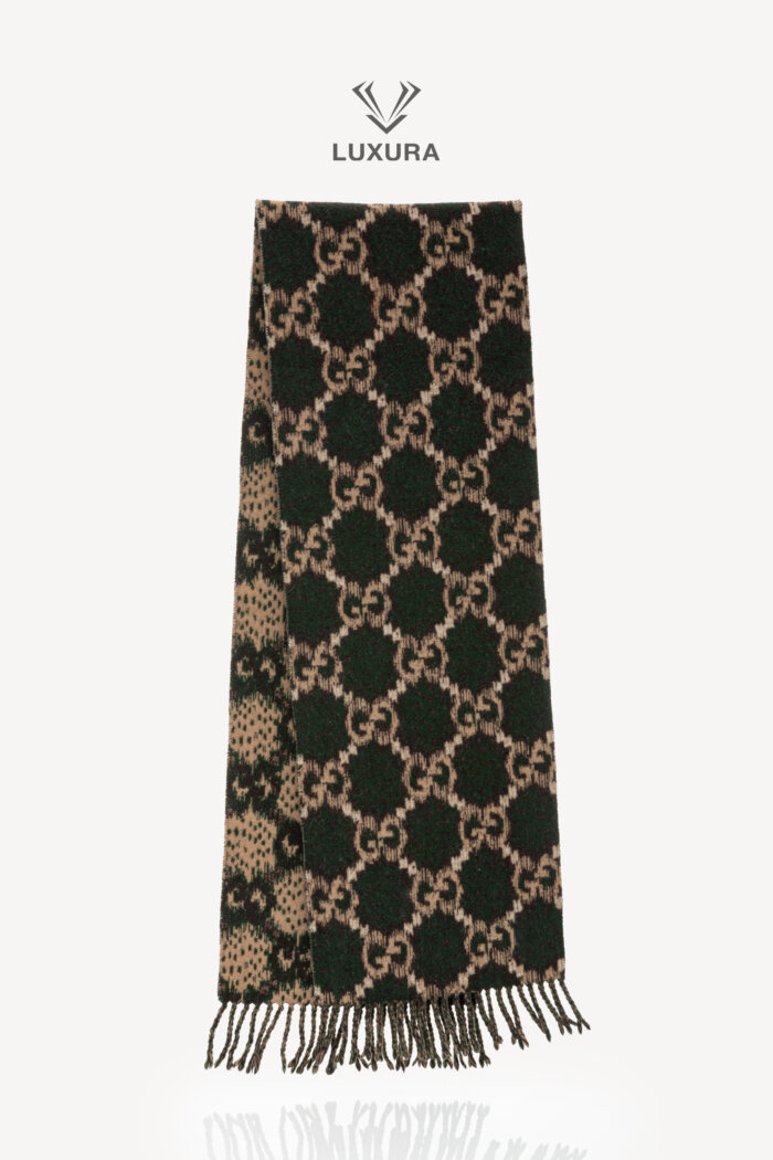 <span style="font-size: 10px;letter-spacing: .15em">HARD TO FIND</span><br>            <strong>GUCCI</strong><br>            <div style="margin-top:10px;font-size:16px">Reversible Wool Scarf Breen-Brown</div><br>