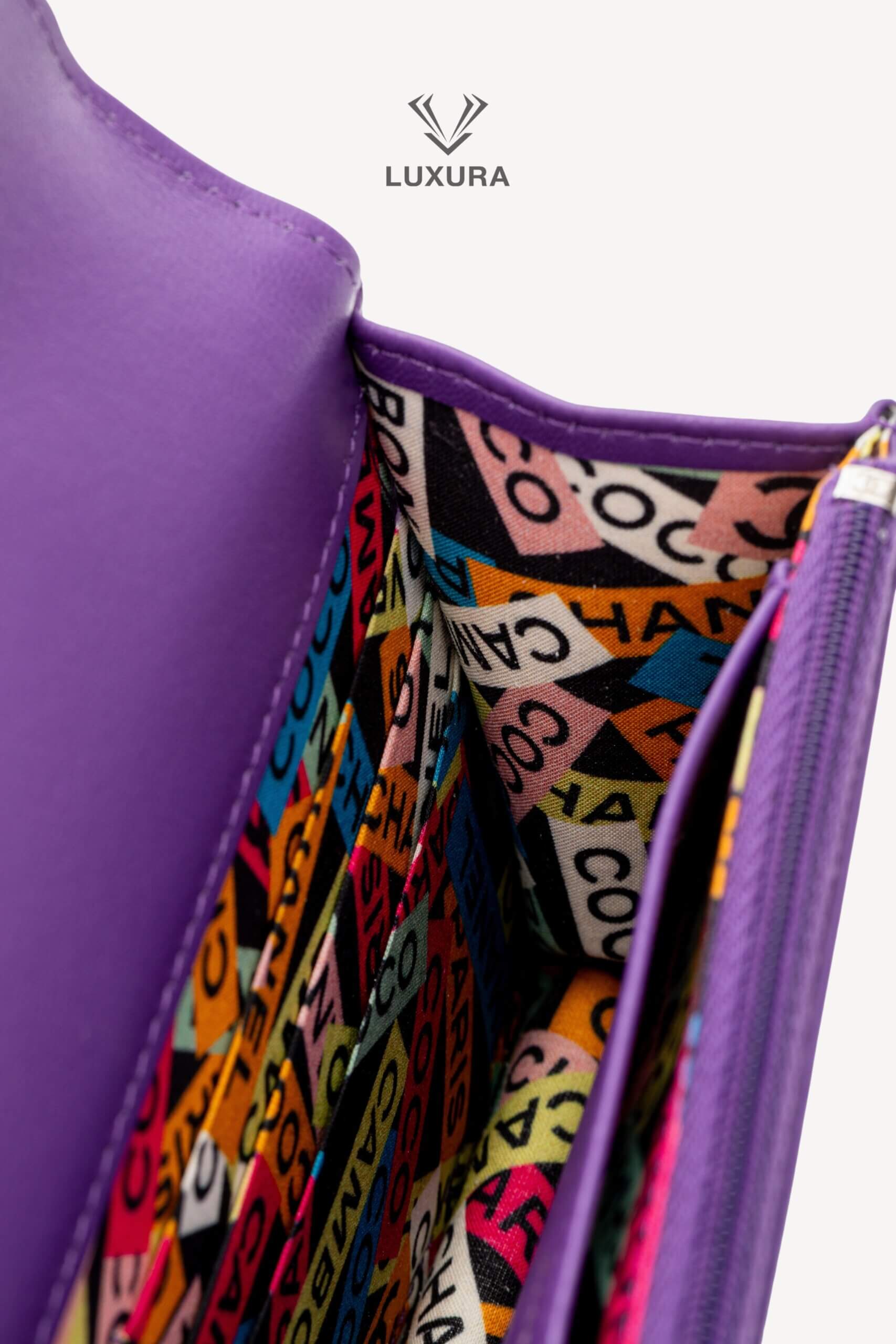 <span style="font-size: 10px;letter-spacing: .15em">HARD TO FIND</span><br>            <strong>CHANEL</strong><br>            <div style="margin-top:10px;font-size:16px">Top Handle Wallet On Chain Purple Lambskin Silver Hardware</div><br> - Image 24