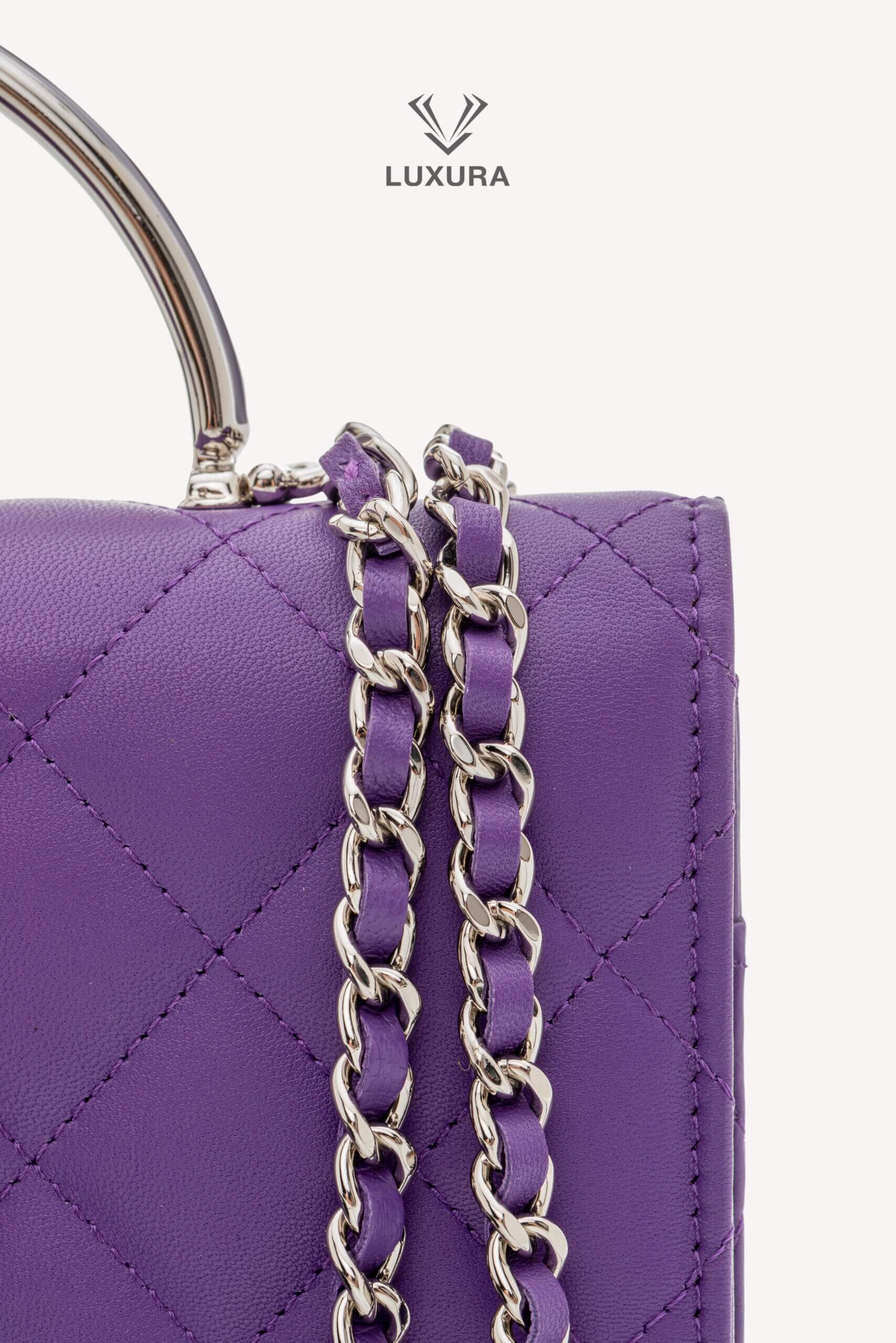 <span style="font-size: 10px;letter-spacing: .15em">HARD TO FIND</span><br>            <strong>CHANEL</strong><br>            <div style="margin-top:10px;font-size:16px">Top Handle Wallet On Chain Purple Lambskin Silver Hardware</div><br> - Image 19