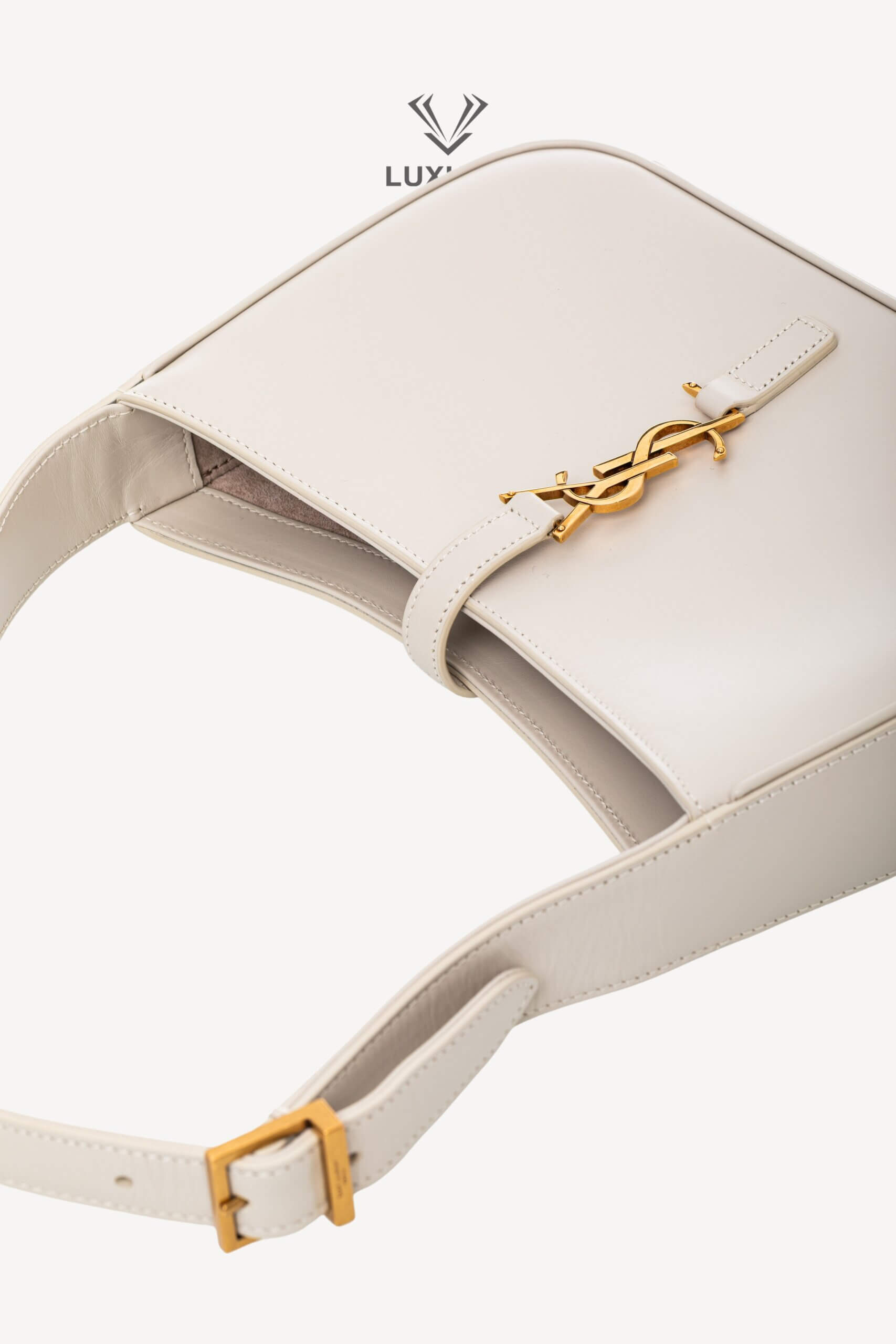 <span style="font-size: 10px;letter-spacing: .15em">HARD TO FIND</span><br>            <strong>SAINT LAURENT</strong><br>            <div style="margin-top:10px;font-size:16px">Smooth Calfskin Le 5 a 7 Hobo Crema Soft</div><br> - Image 9