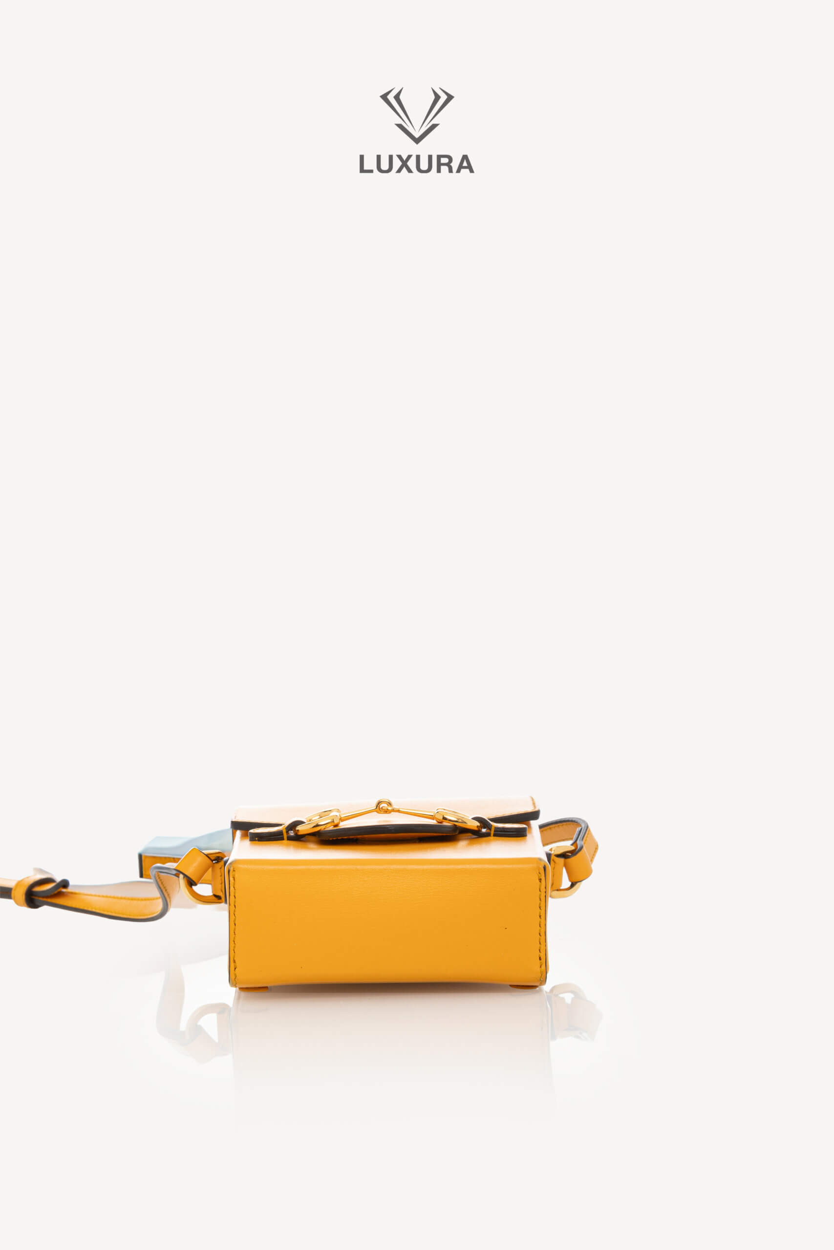 <span style="font-size: 10px;letter-spacing: .15em">HARD TO FIND</span><br>            <strong>GUCCI</strong><br>            <div style="margin-top:10px;font-size:16px">Mini Horsebit 1955 Shoulder Bag Yellow</div><br> - Image 20
