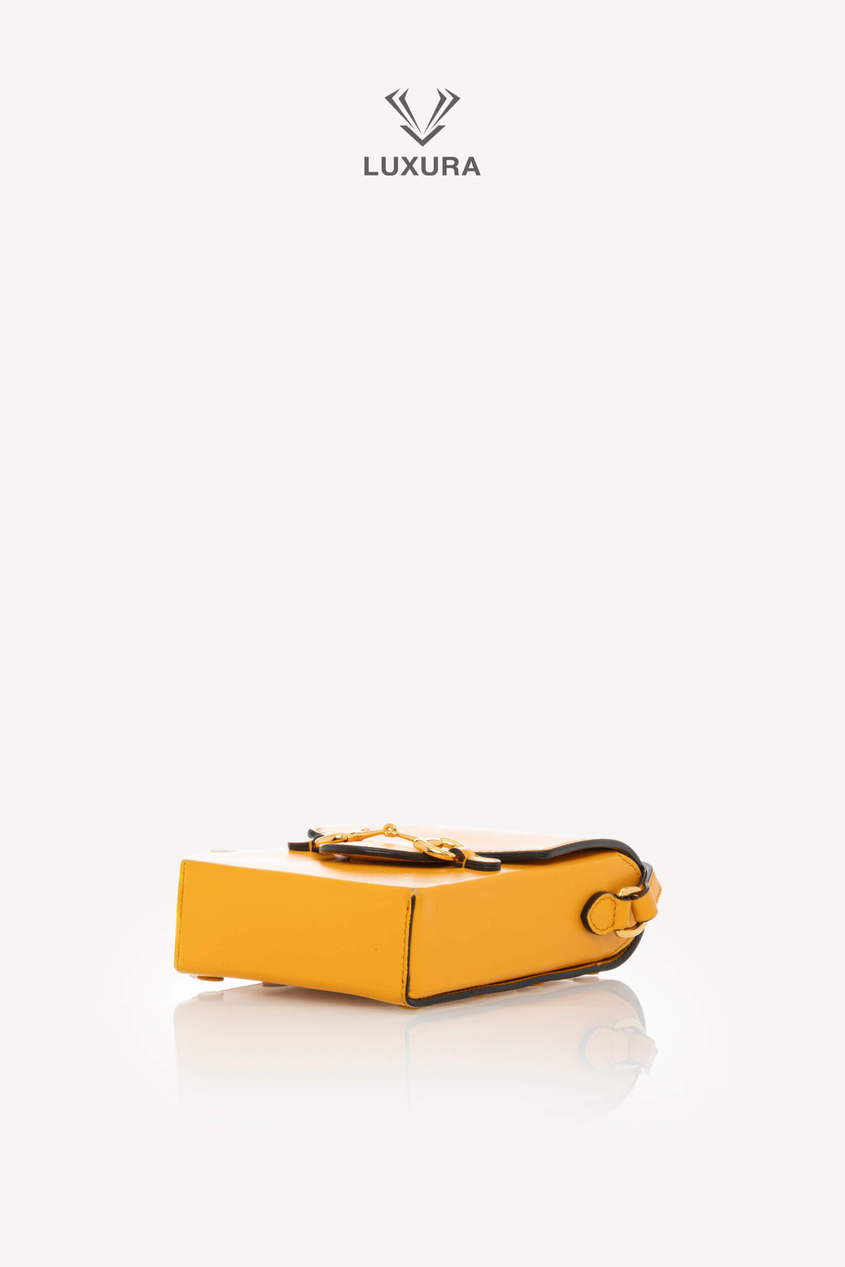 <span style="font-size: 10px;letter-spacing: .15em">HARD TO FIND</span><br>            <strong>GUCCI</strong><br>            <div style="margin-top:10px;font-size:16px">Mini Horsebit 1955 Shoulder Bag Yellow</div><br> - Image 21