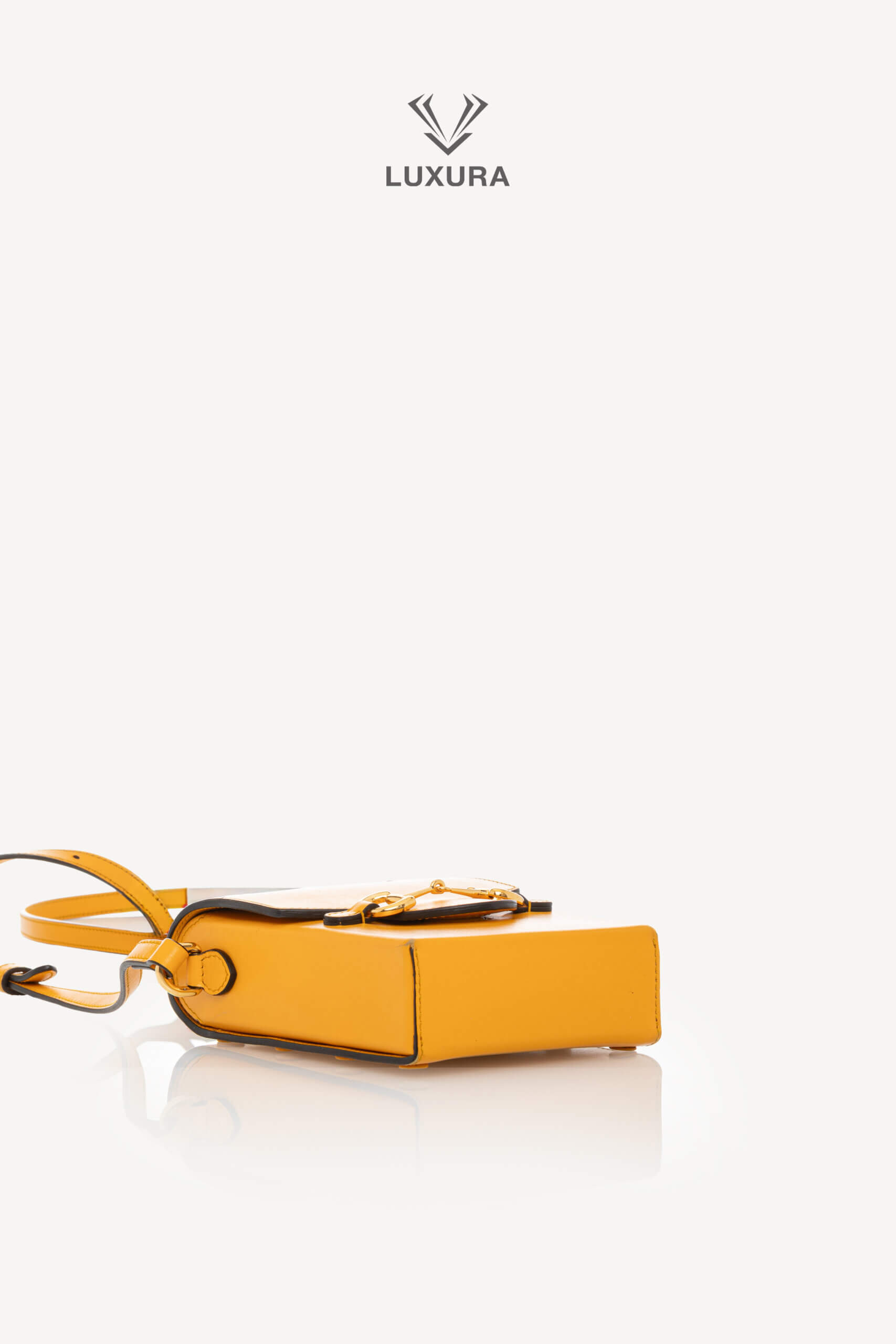 <span style="font-size: 10px;letter-spacing: .15em">HARD TO FIND</span><br>            <strong>GUCCI</strong><br>            <div style="margin-top:10px;font-size:16px">Mini Horsebit 1955 Shoulder Bag Yellow</div><br> - Image 19