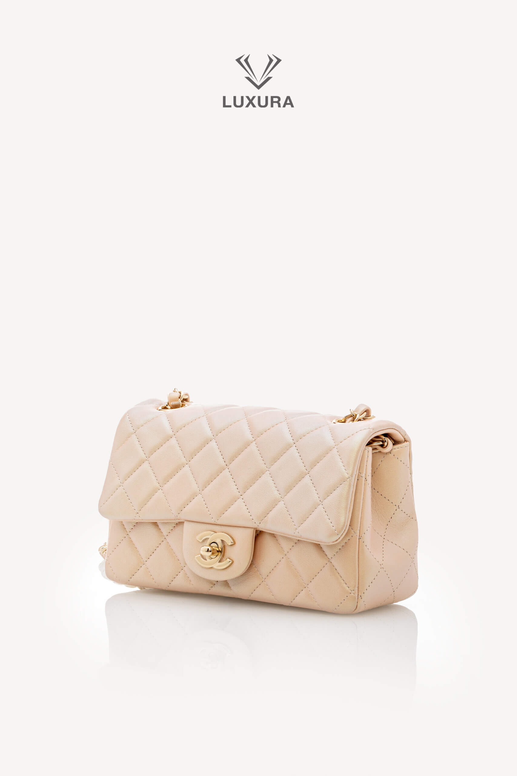 <span style="font-size: 10px;letter-spacing: .15em">HARD TO FIND</span><br>            <strong>CHANEL</strong><br>            <div style="margin-top:10px;font-size:16px">Classic Mini Rectangular Flap Bag Baby Pink Iridescent Lambskin Leather</div><br> - Image 9