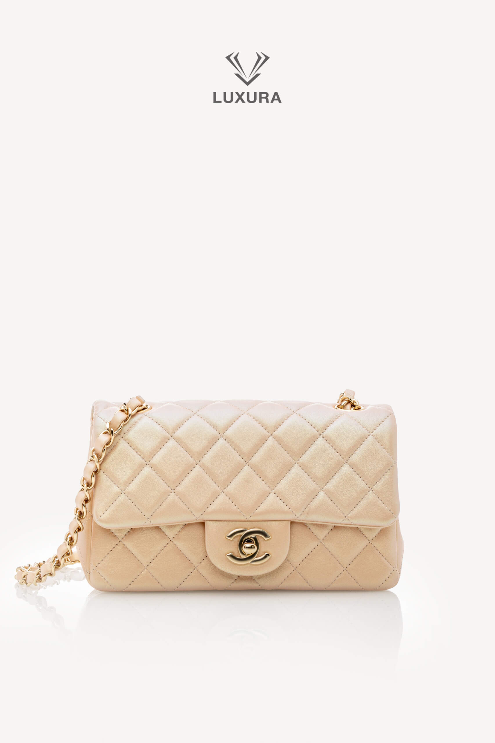 <span style="font-size: 10px;letter-spacing: .15em">HARD TO FIND</span><br>            <strong>CHANEL</strong><br>            <div style="margin-top:10px;font-size:16px">Classic Mini Rectangular Flap Bag Baby Pink Iridescent Lambskin Leather</div><br> - Image 4
