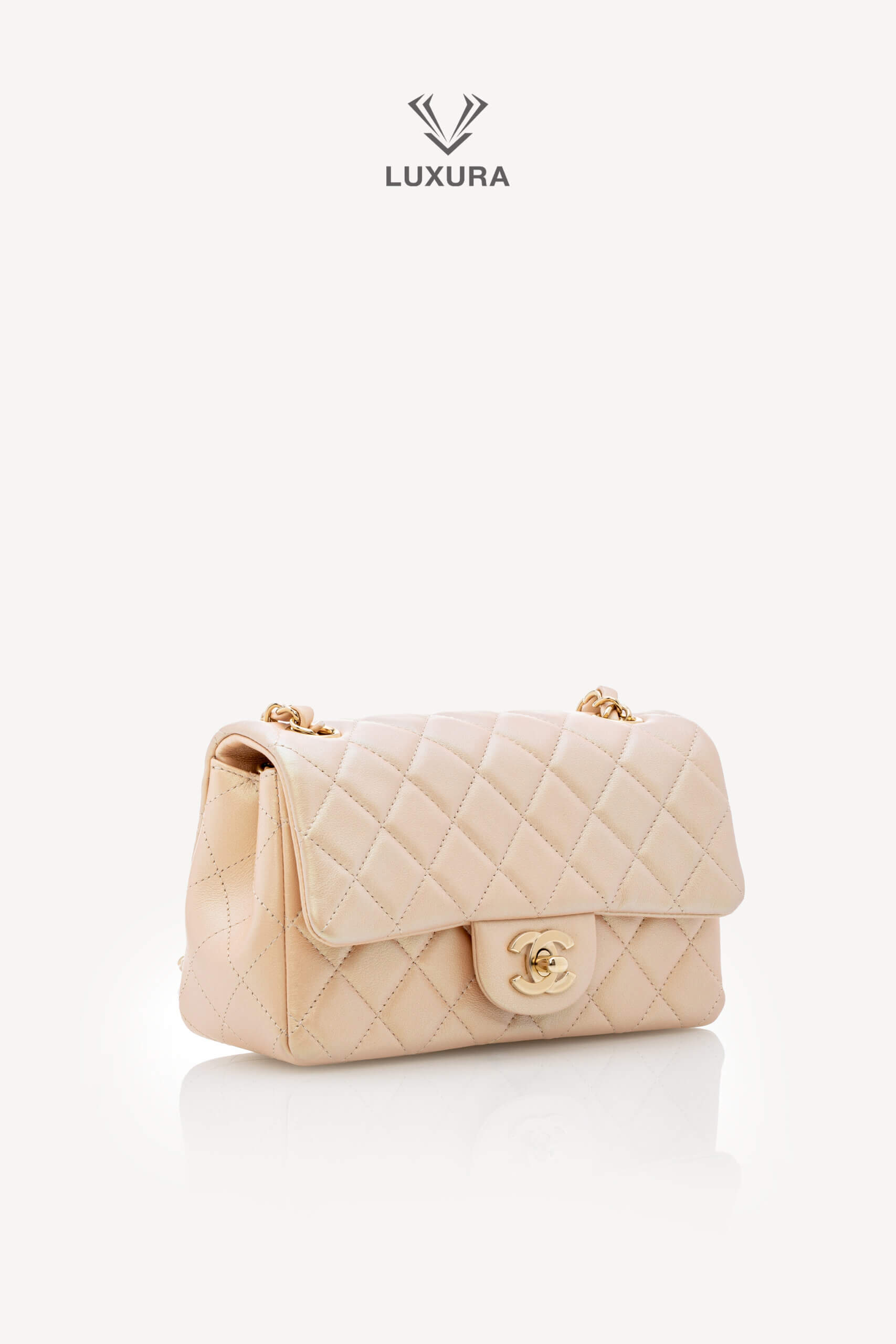 <span style="font-size: 10px;letter-spacing: .15em">HARD TO FIND</span><br>            <strong>CHANEL</strong><br>            <div style="margin-top:10px;font-size:16px">Classic Mini Rectangular Flap Bag Baby Pink Iridescent Lambskin Leather</div><br> - Image 3