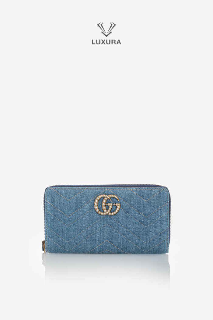 <span style="font-size: 10px;letter-spacing: .15em">HARD TO FIND</span><br>            <strong>GUCCI</strong><br>            <div style="margin-top:10px;font-size:16px">Denim Matelasse Pearly GG Marmont Zip Around Wallet Blue</div><br>