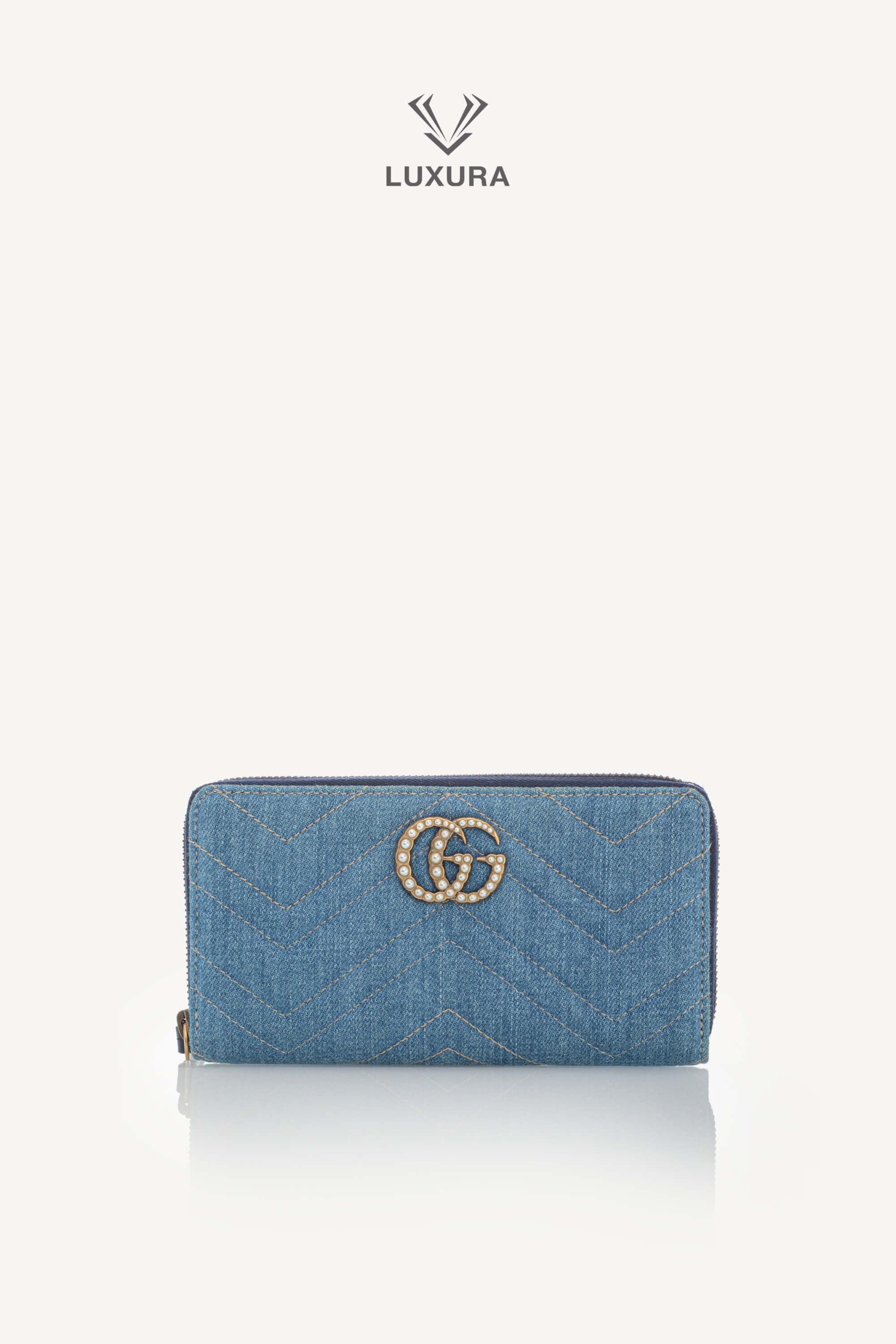 <span style="font-size: 10px;letter-spacing: .15em">HARD TO FIND</span><br>            <strong>GUCCI</strong><br>            <div style="margin-top:10px;font-size:16px">Denim Matelasse Pearly GG Marmont Zip Around Wallet Blue</div><br>