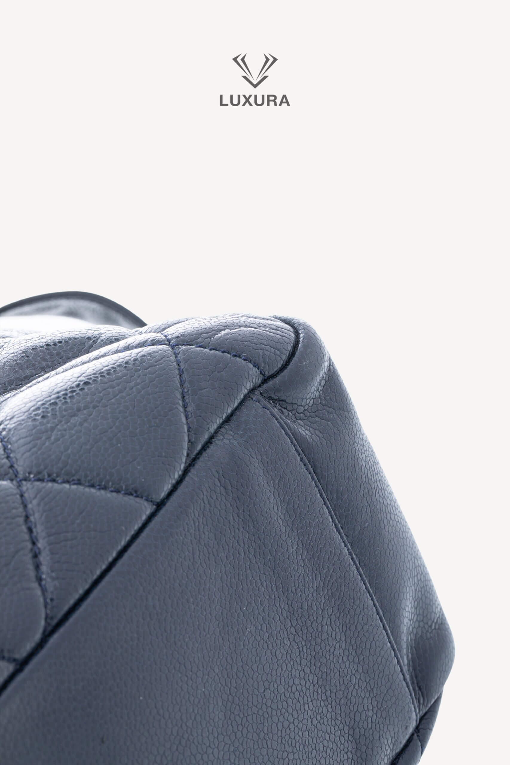 <span style="font-size: 10px;letter-spacing: .15em">HARD TO FIND</span><br>            <strong>CHANEL</strong><br>            <div style="margin-top:10px;font-size:16px">Quilted Soft Glazed Caviar Leather Large Stretch Spirit Messenger Flap Bag Indigo</div><br> - Image 21