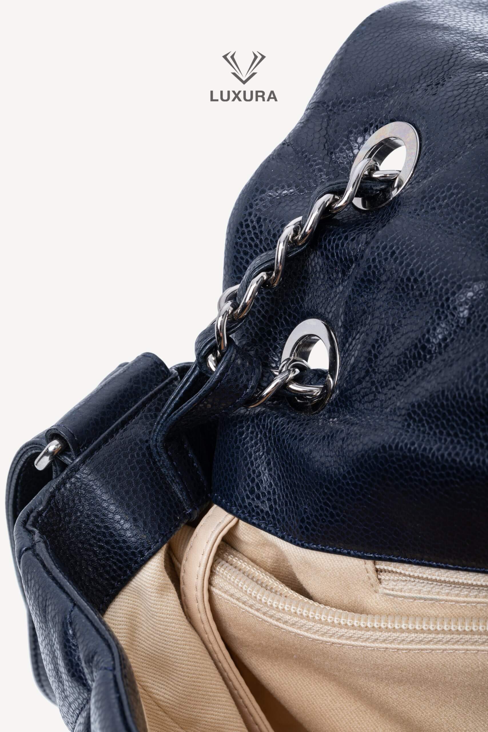 <span style="font-size: 10px;letter-spacing: .15em">HARD TO FIND</span><br>            <strong>CHANEL</strong><br>            <div style="margin-top:10px;font-size:16px">Quilted Soft Glazed Caviar Leather Large Stretch Spirit Messenger Flap Bag Indigo</div><br> - Image 18