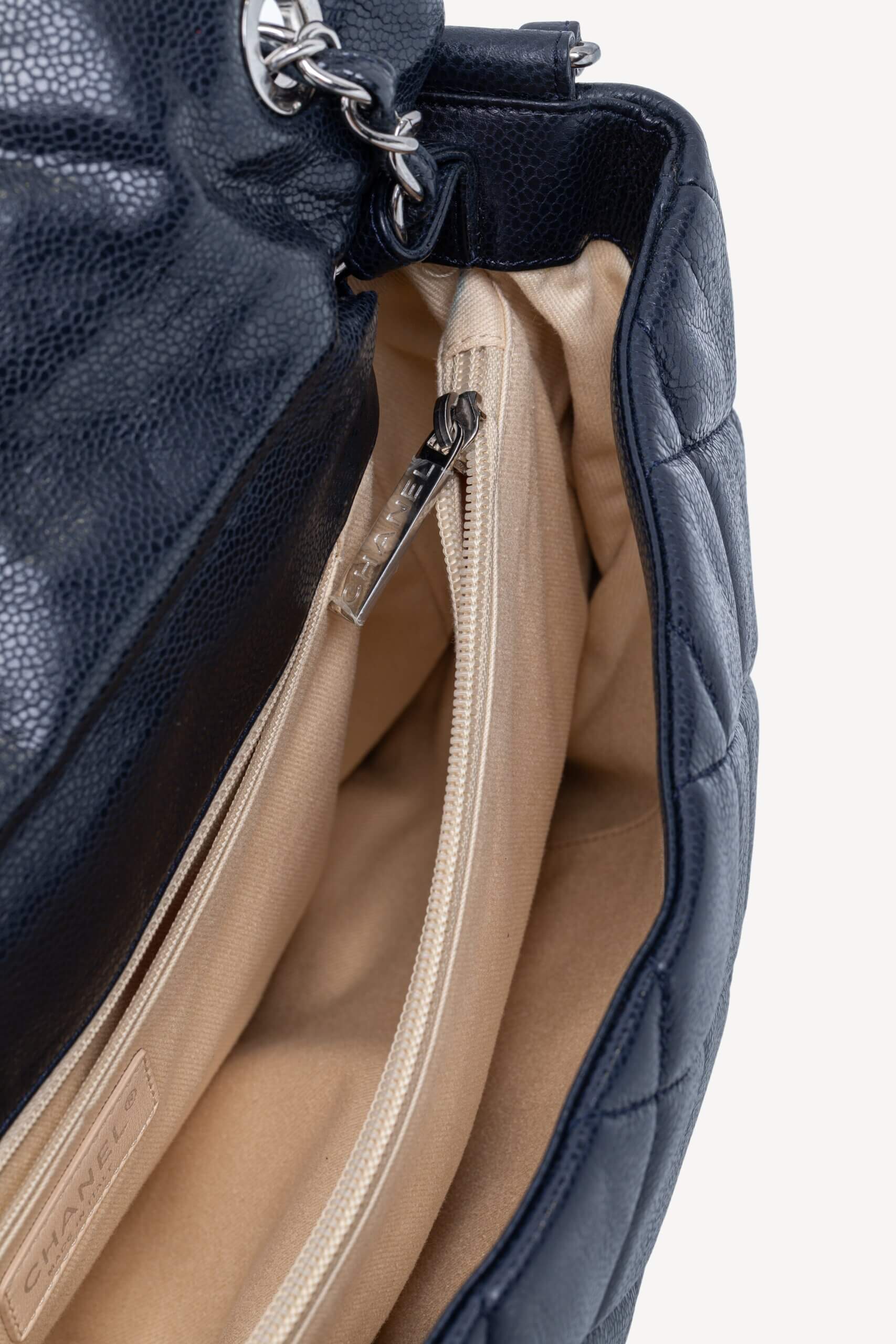 <span style="font-size: 10px;letter-spacing: .15em">HARD TO FIND</span><br>            <strong>CHANEL</strong><br>            <div style="margin-top:10px;font-size:16px">Quilted Soft Glazed Caviar Leather Large Stretch Spirit Messenger Flap Bag Indigo</div><br> - Image 23