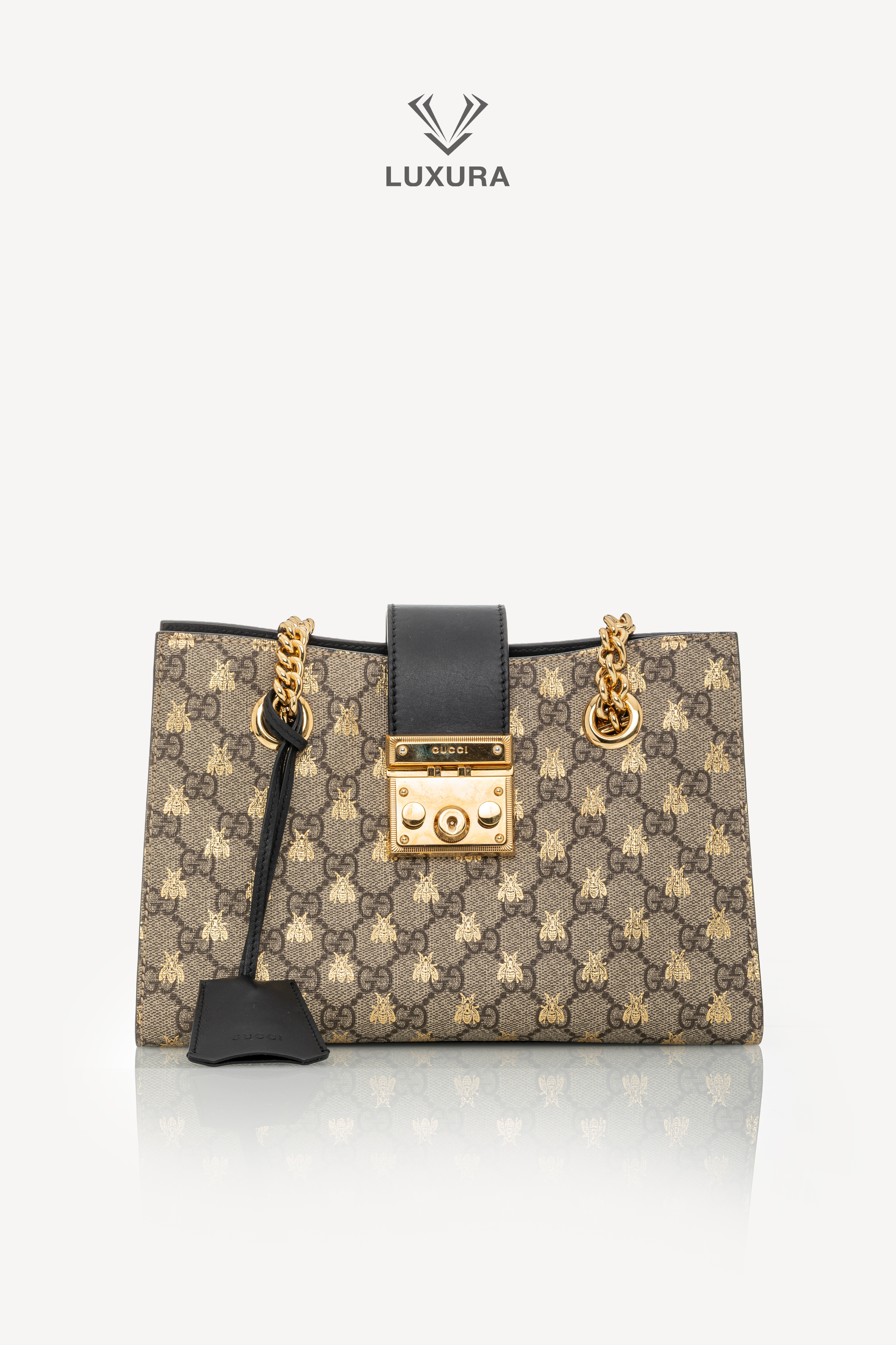 <span style="font-size: 10px;letter-spacing: .15em">HARD TO FIND</span><br>            <strong>GUCCI</strong><br>            <div style="margin-top:10px;font-size:16px">GG Supreme Monogram Bees Small Padlock Tote Beige Oro Black</div><br> - Image 5