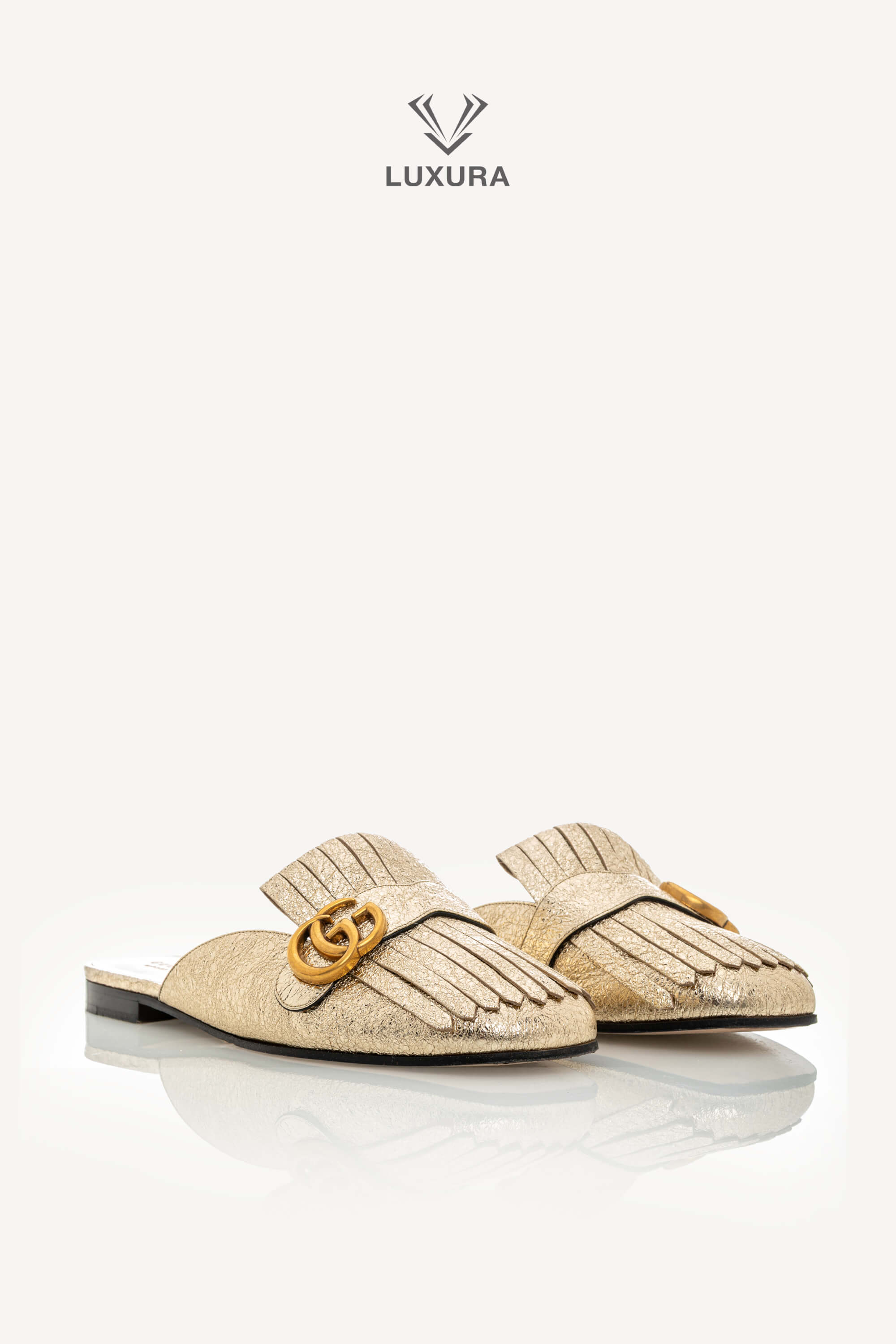 <span style="font-size: 10px;letter-spacing: .15em">BEST DEAL</span><br> <strong>GUCCI</strong><br> <div style="margin-top:10px;font-size:16px">Metallic Marmont Fringed Flat Mules Gold 41 ( true size 40 )</div><br> - Image 6