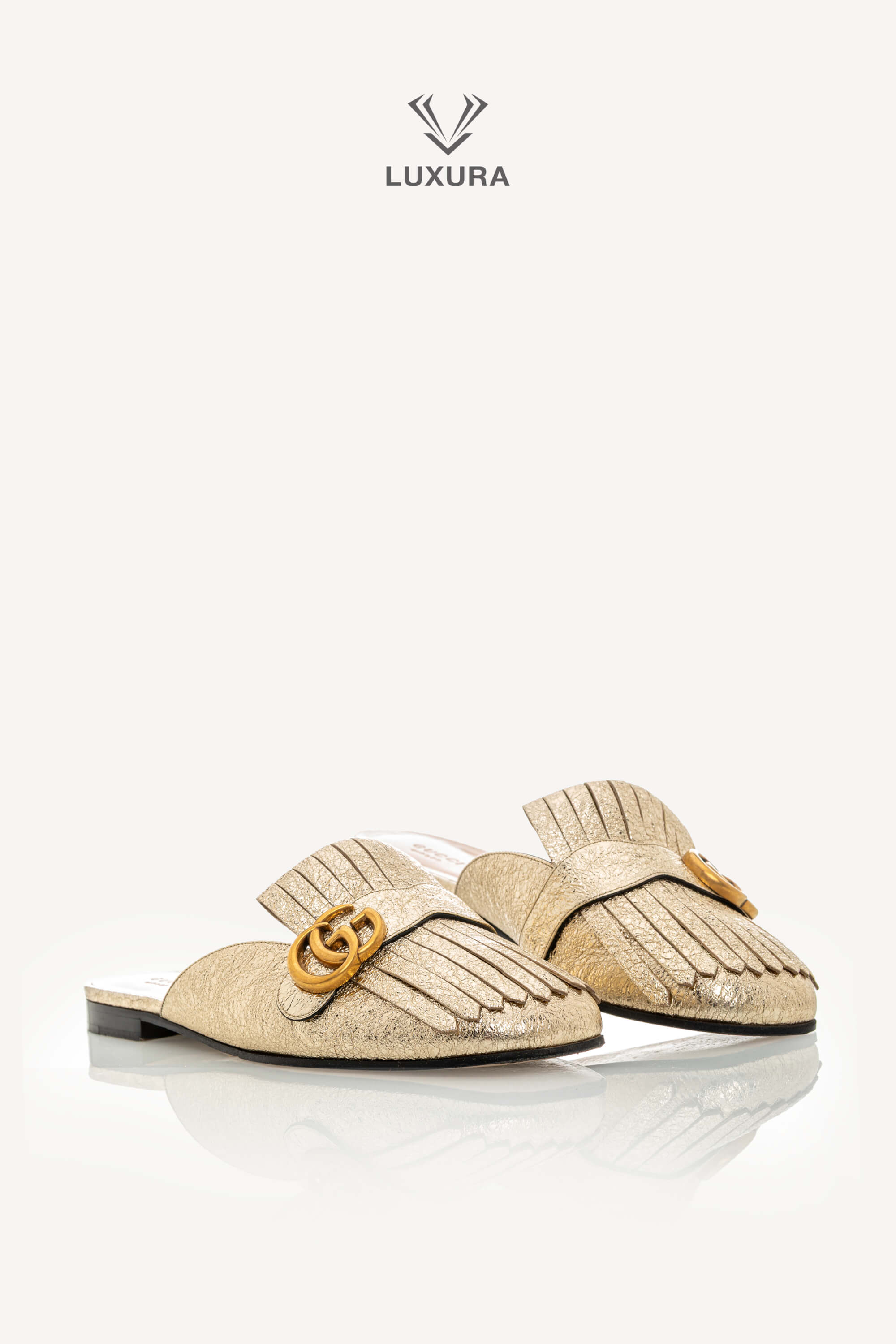 <span style="font-size: 10px;letter-spacing: .15em">BEST DEAL</span><br> <strong>GUCCI</strong><br> <div style="margin-top:10px;font-size:16px">Metallic Marmont Fringed Flat Mules Gold 41 ( true size 40 )</div><br> - Image 5